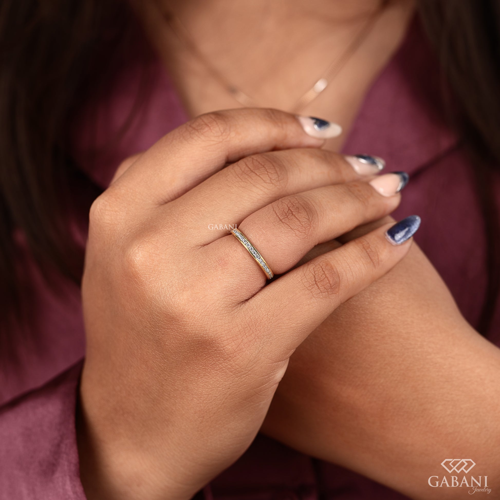 slim yellow gold wedding band with channel set lab grown diamonds