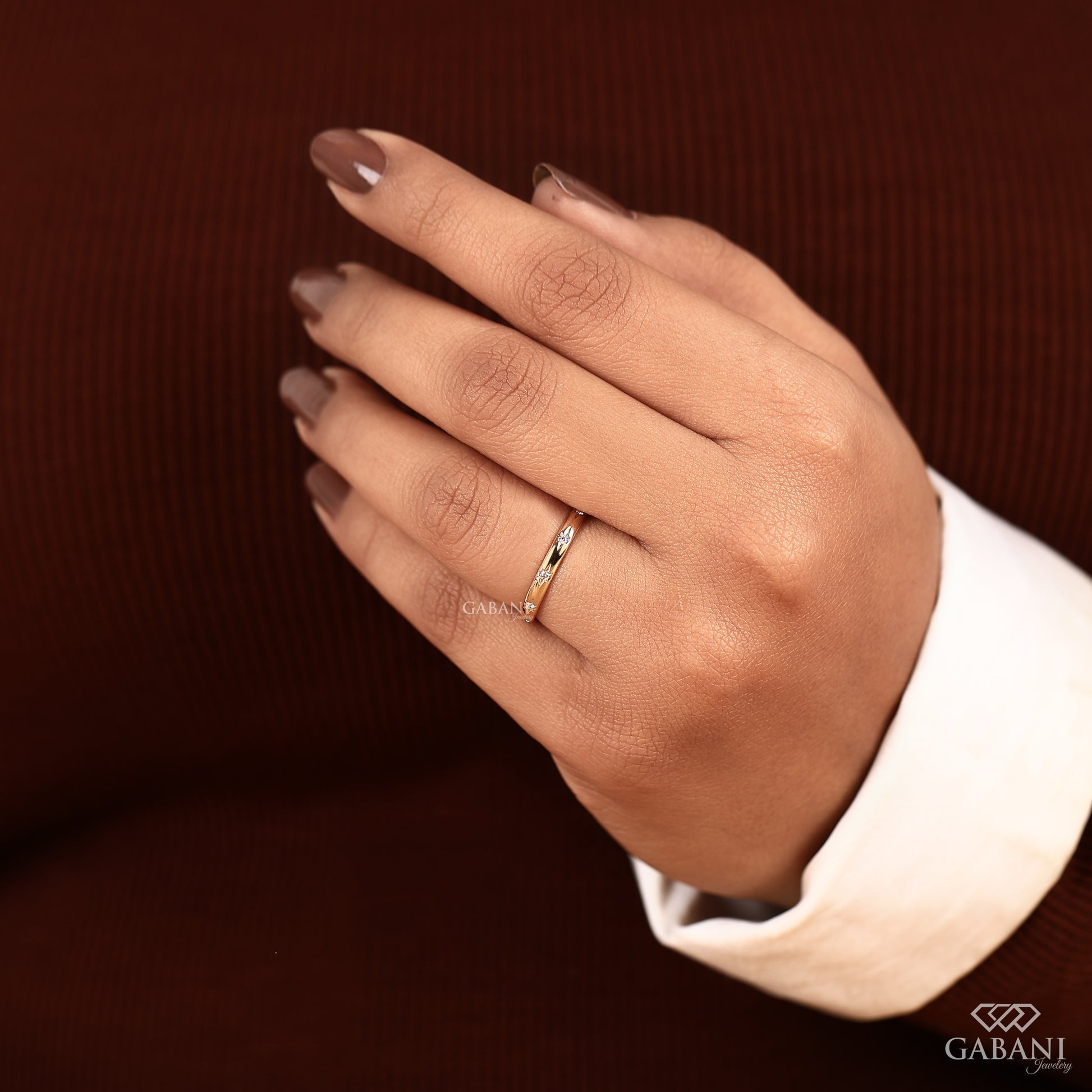 minimal flush set diamond wedding band in smooth yellow gold
