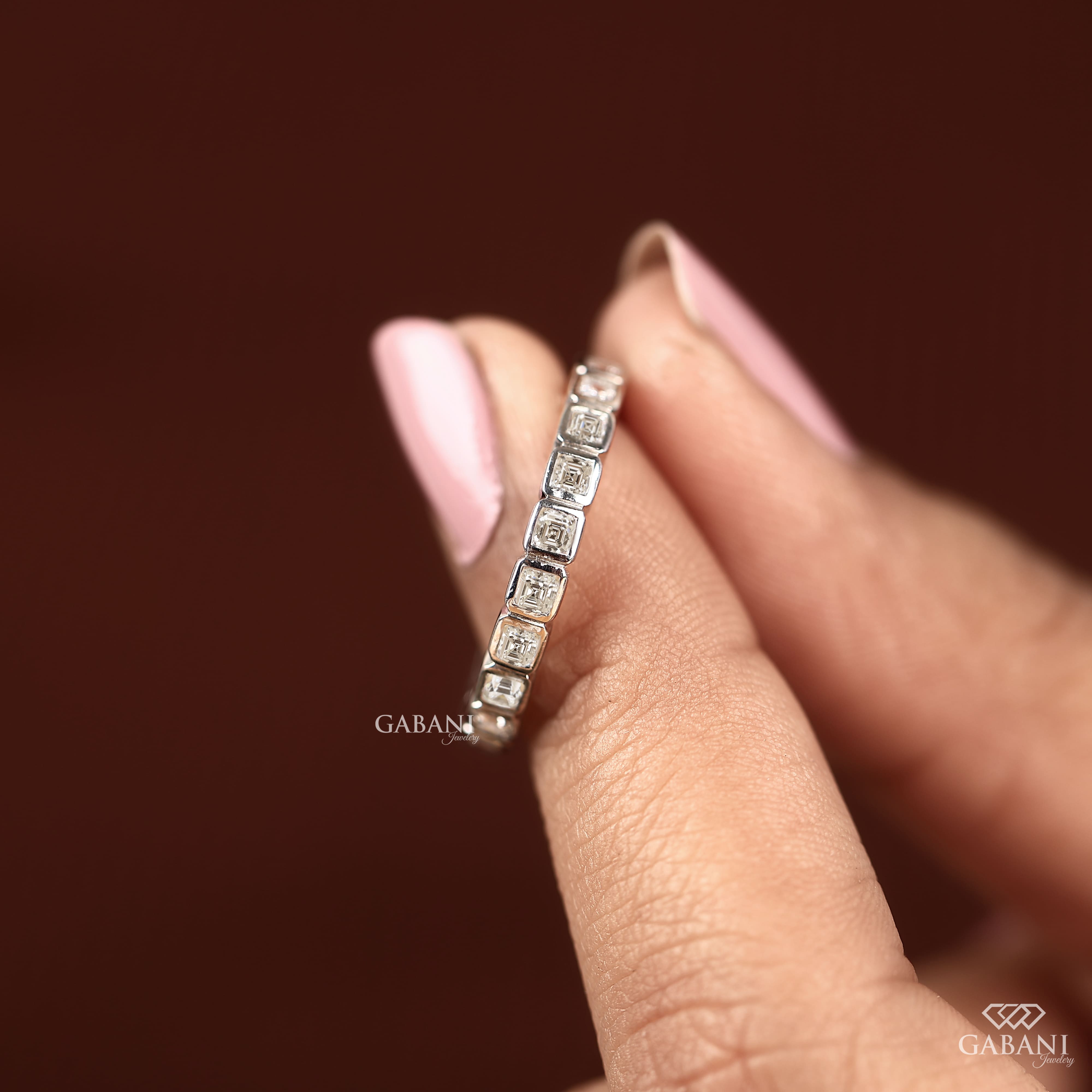 Asscher cut lab grown diamond full eternity band in white gold with bezel set EF color VS1 clarity diamonds, designed as a wedding, anniversary, bridal, or stackable ring.