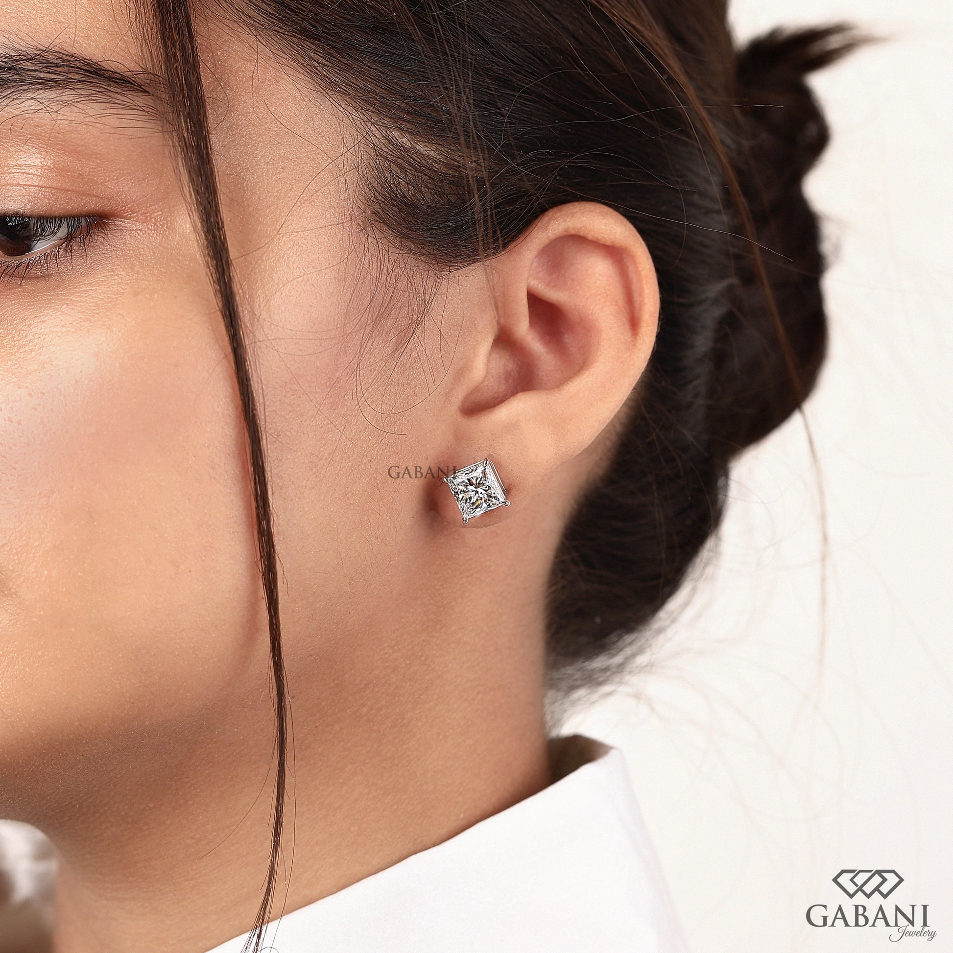 IGI certified princess cut lab grown diamond stud earrings by GABANI JEWELRY 
