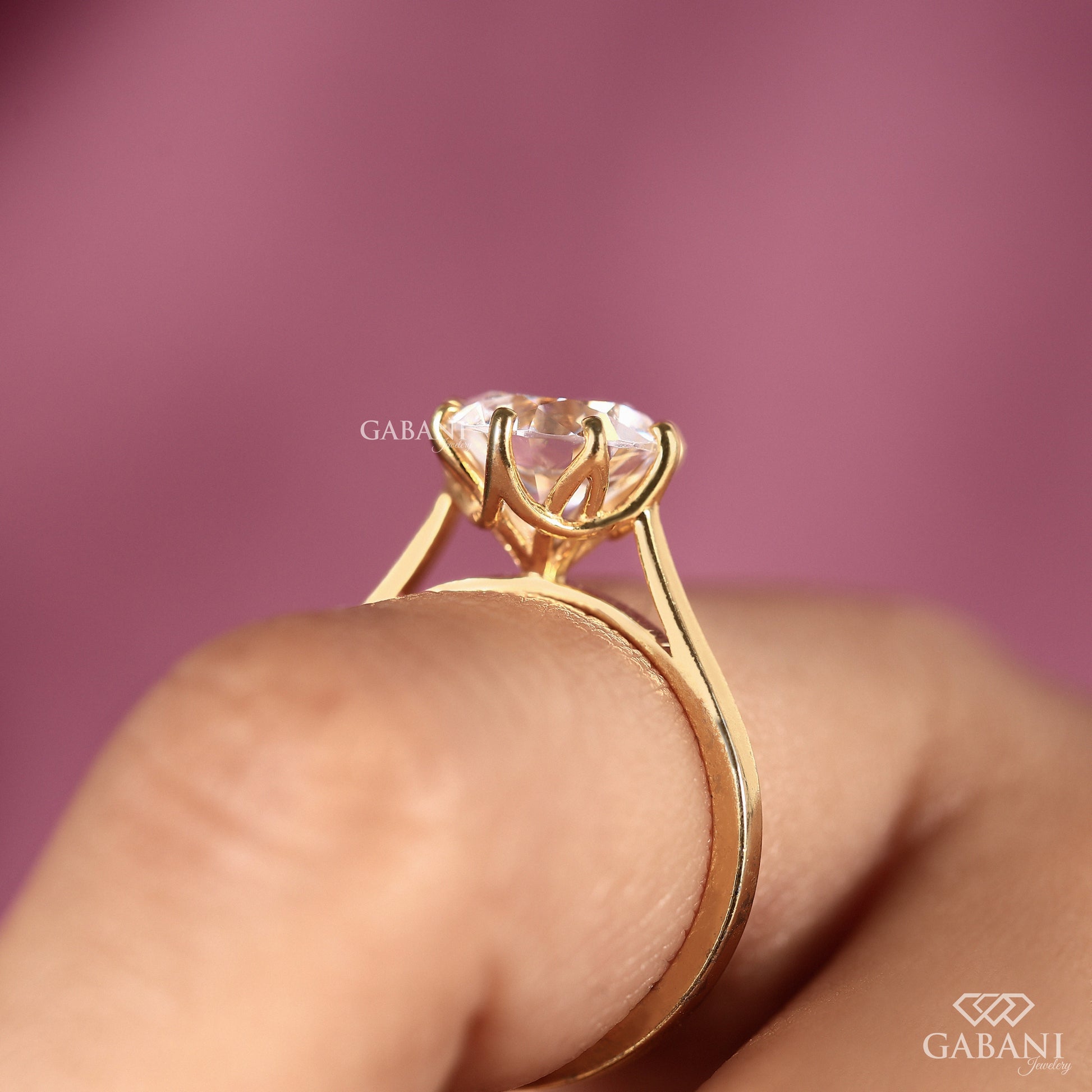 round lab grown diamond engagement ring by gabani jewelry with tulip setting