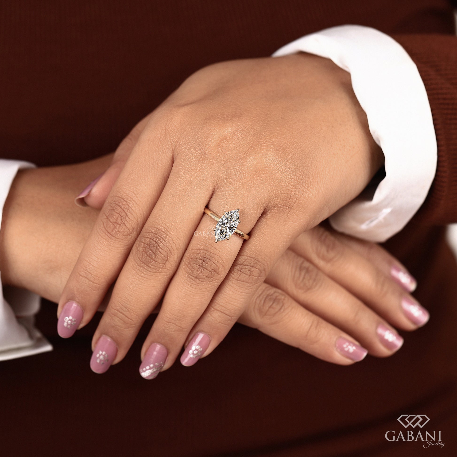 Marquise cut lab created diamond engagement ring in yellow gold
