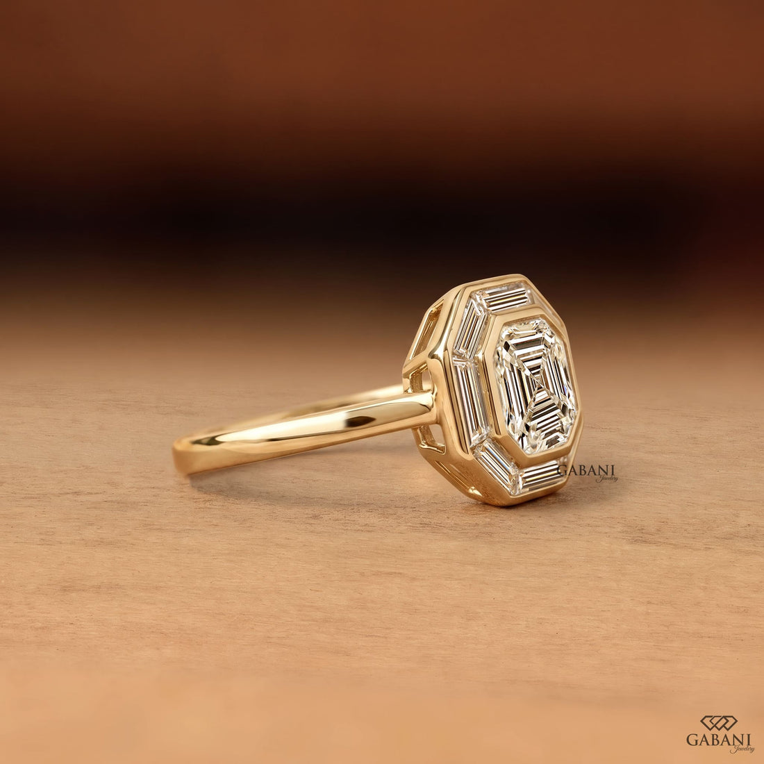 Asscher cut lab grown diamond engagement ring with baguette diamond halo in 18K yellow gold, featuring a vintage Art Deco design.