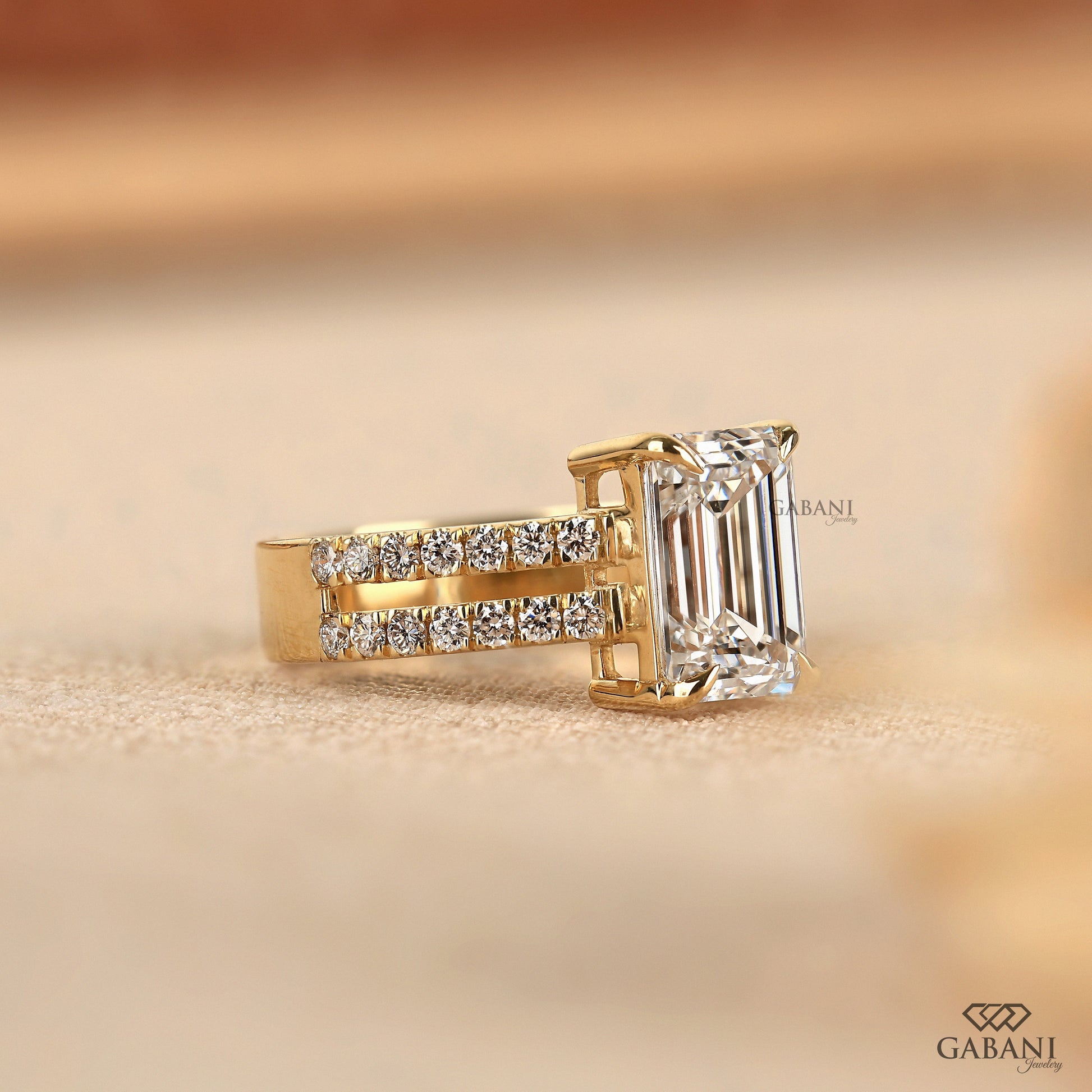 Lab grown diamond emerald cut ring with pavé side stones
