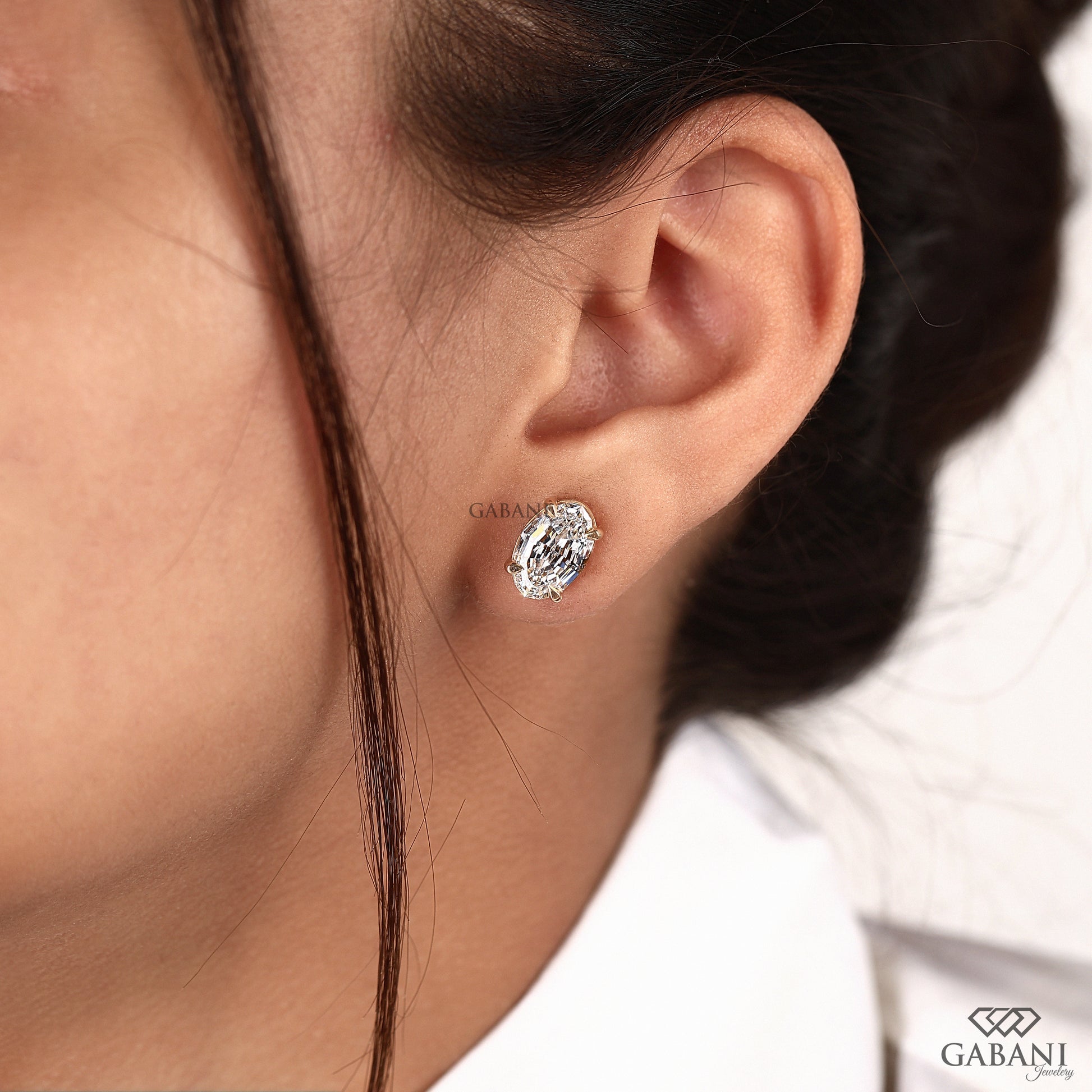 lab grown diamond stud earrings with oval step cut design