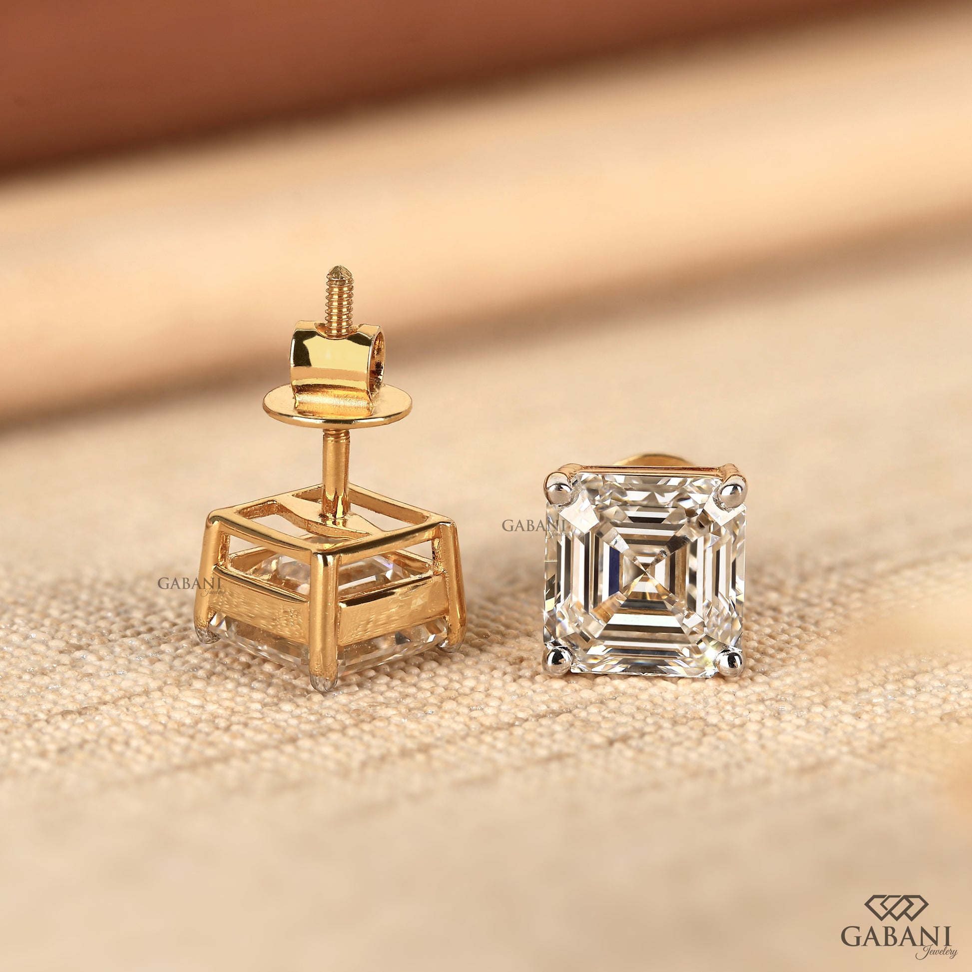 Asscher cut lab grown diamond earrings in yellow gold with classic screw back design