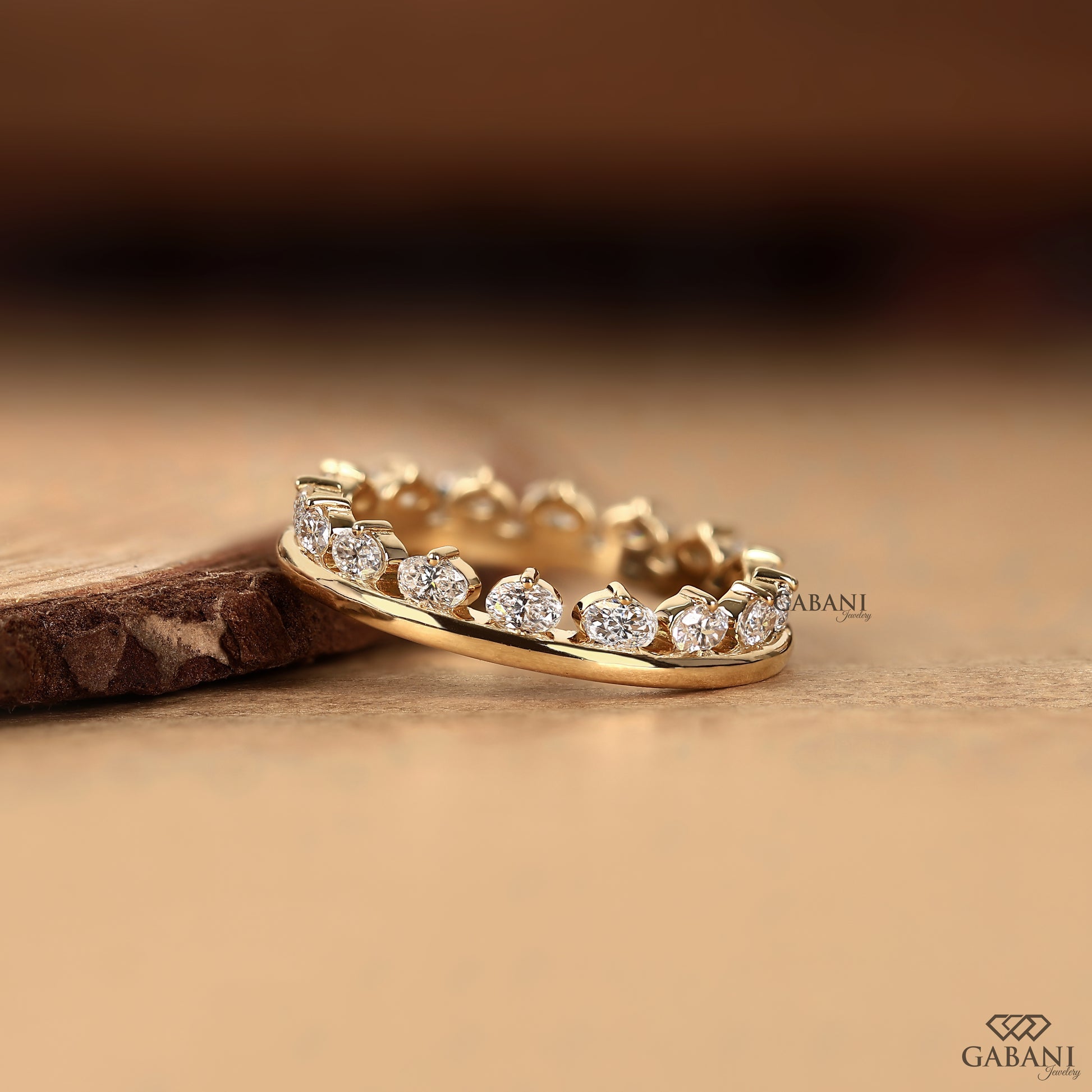Gabani Jewelry oval diamond wedding band in yellow gold