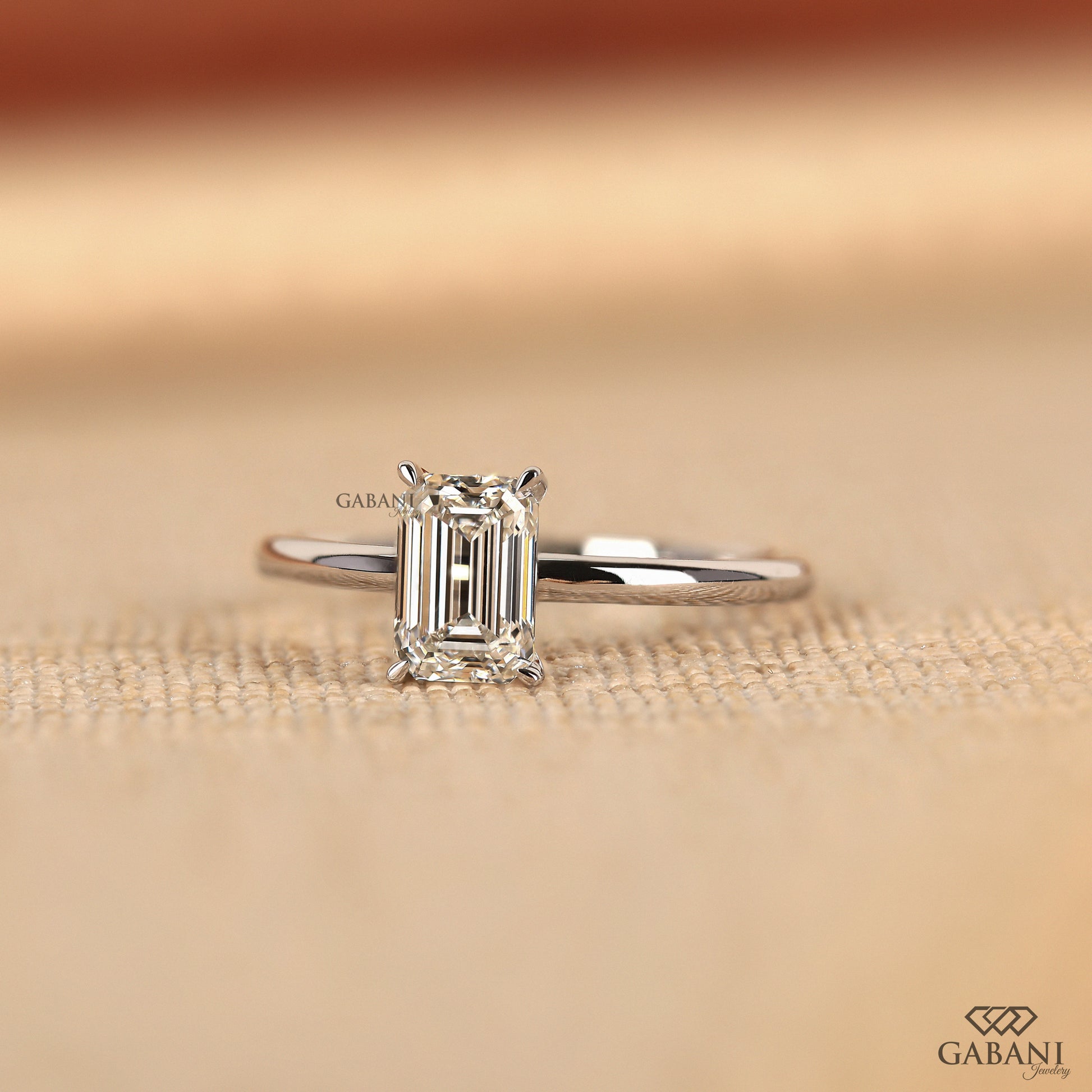 emerald cut lab grown diamond ring designed for everyday comfort in white gold