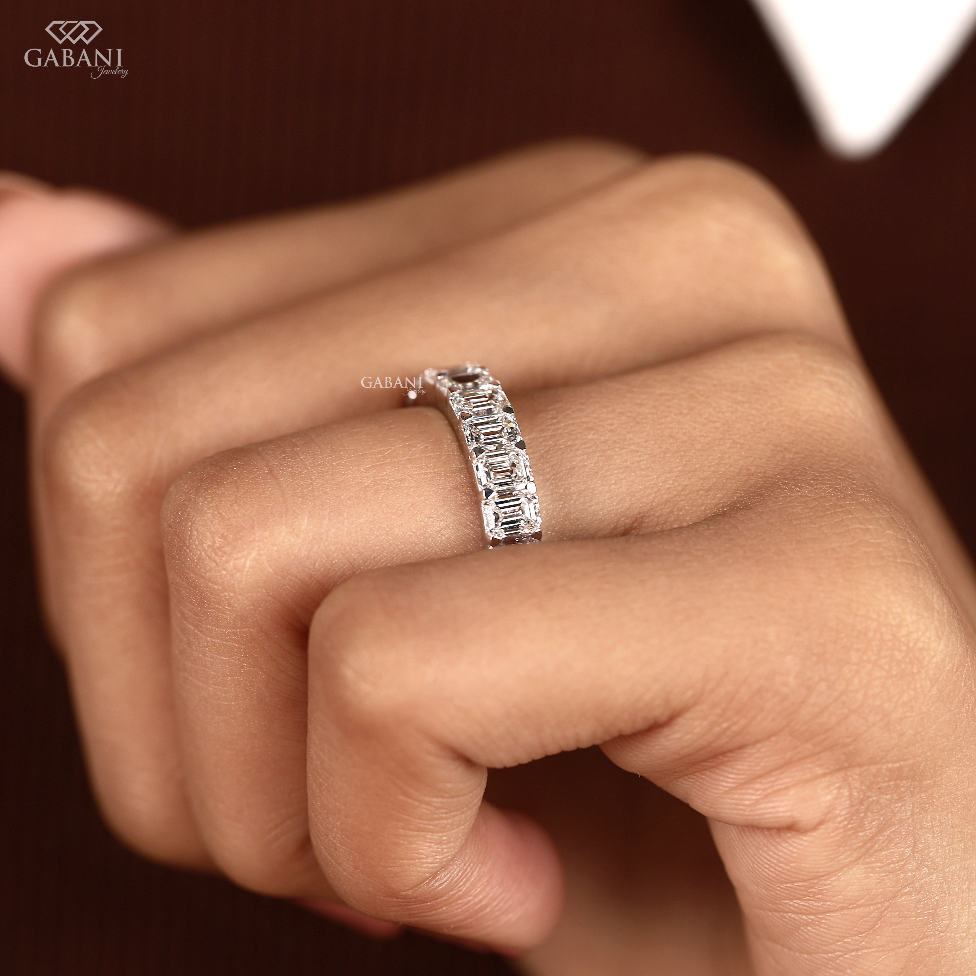 Gabani Jewelry emerald cut lab grown diamond wedding band displayed as a refined white gold matching ring
