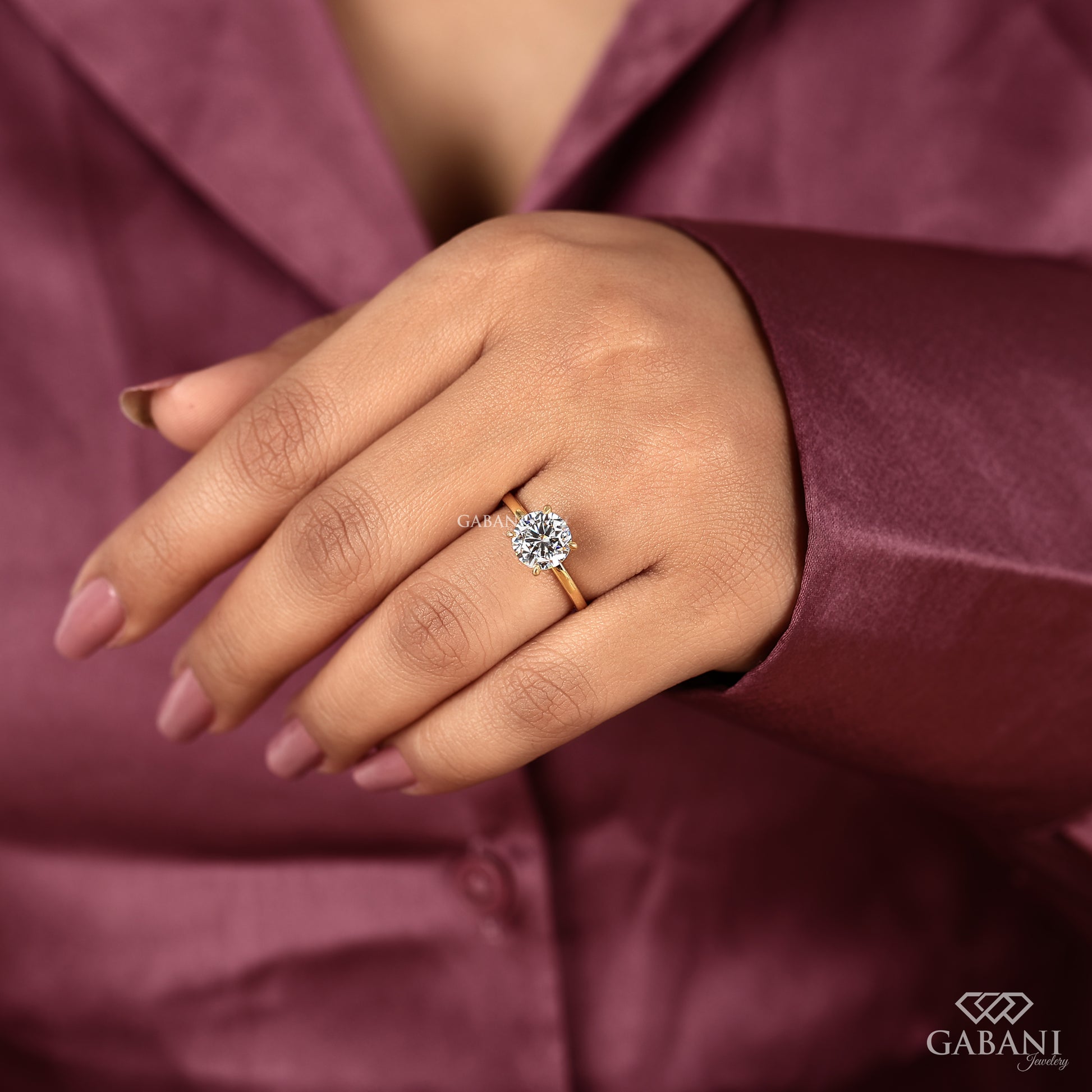 round cut lab grown diamond ring with low profile prong setting in gold