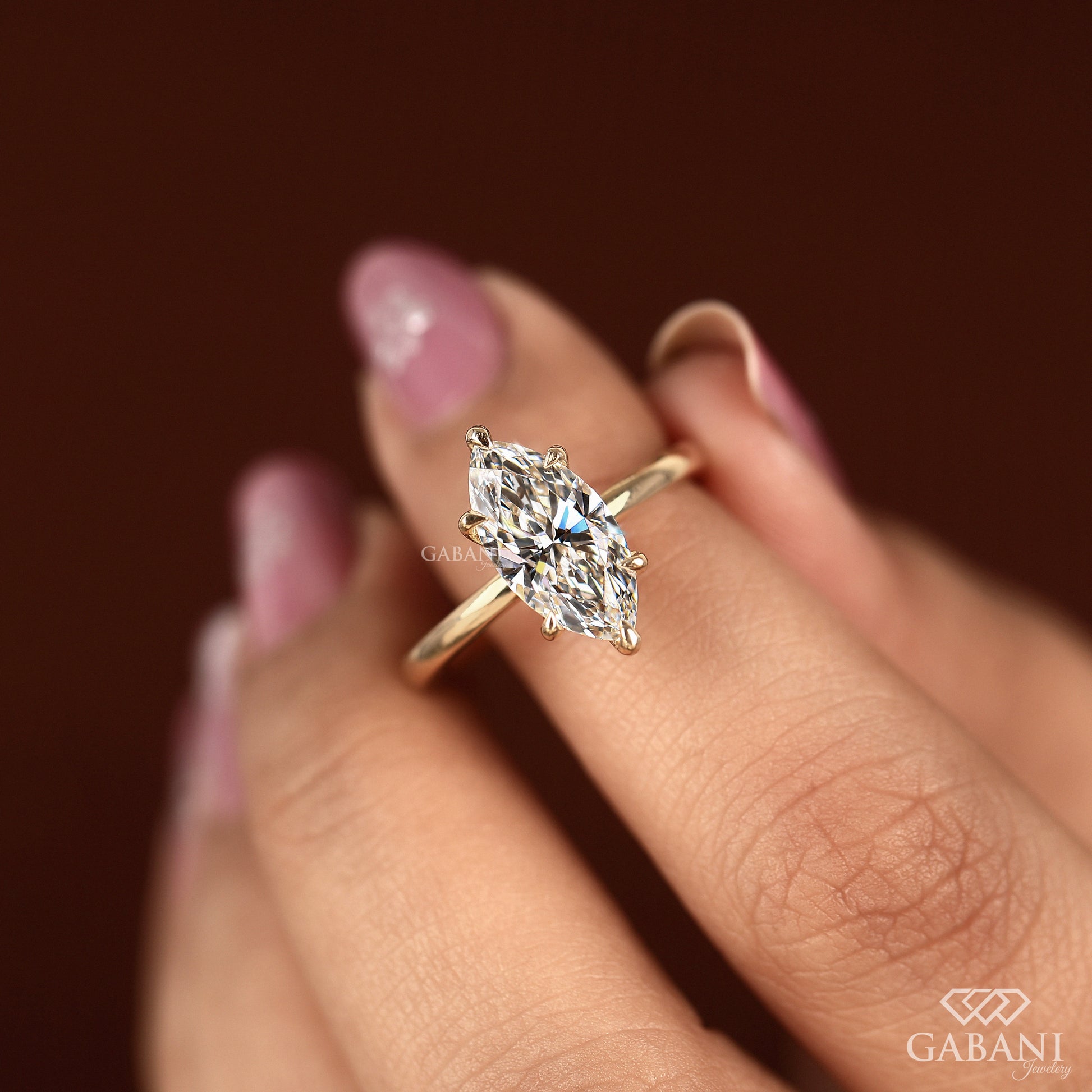 IGI certified marquise lab diamond ring in yellow gold
