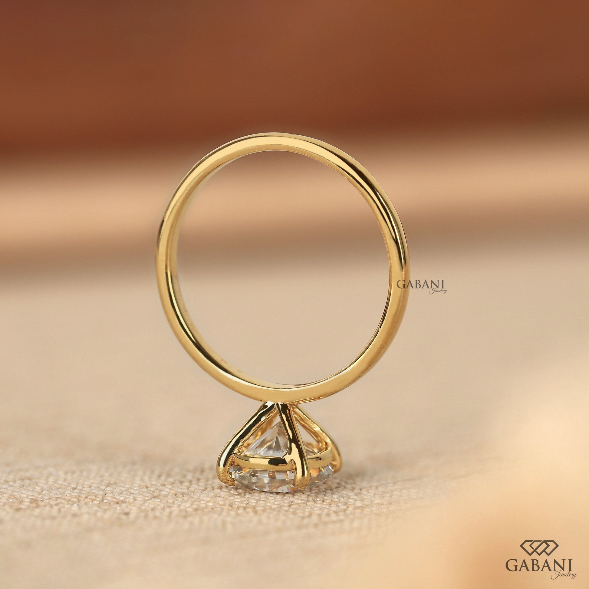 minimal round lab grown diamond solitaire ring in smooth yellow gold