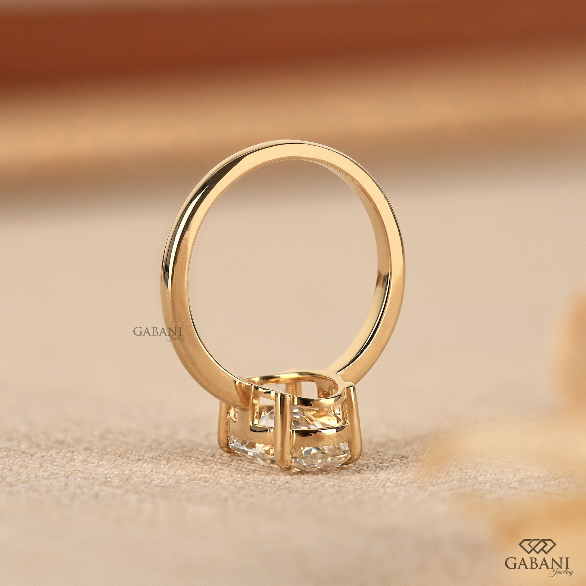 oval lab grown diamond ring with button prong setting
