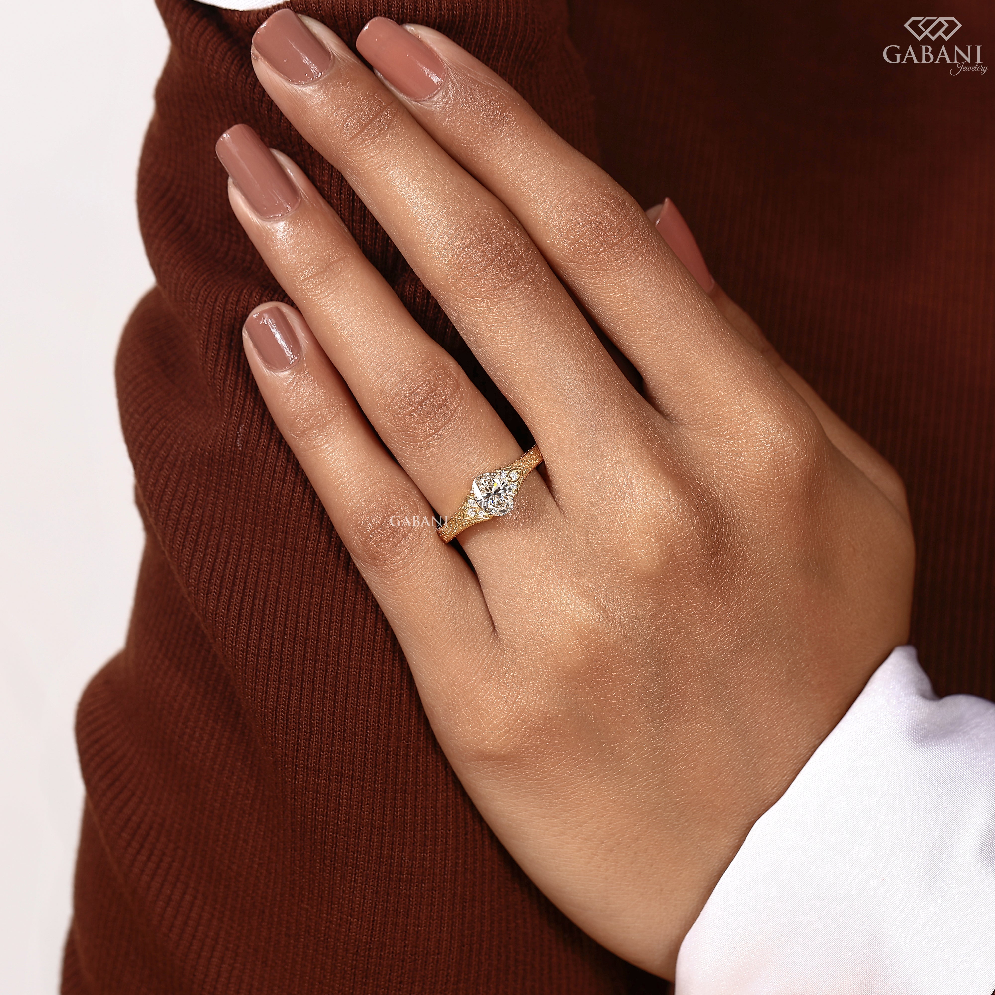 Vintage engraved oval diamond ring