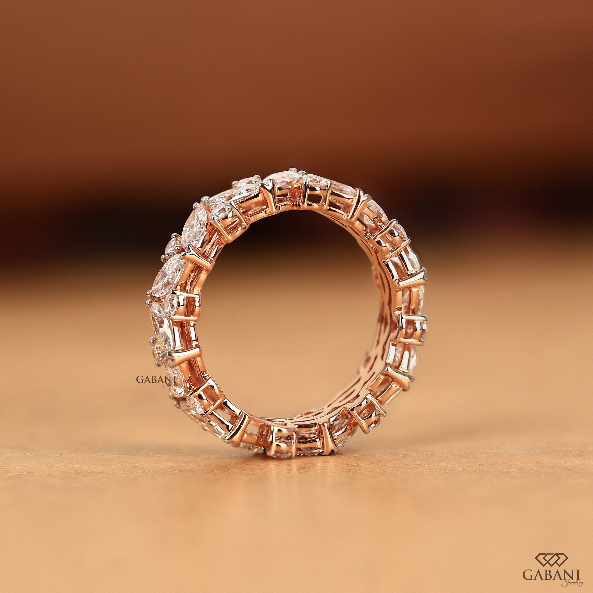 marquise and round diamond band in rose gold full eternity style