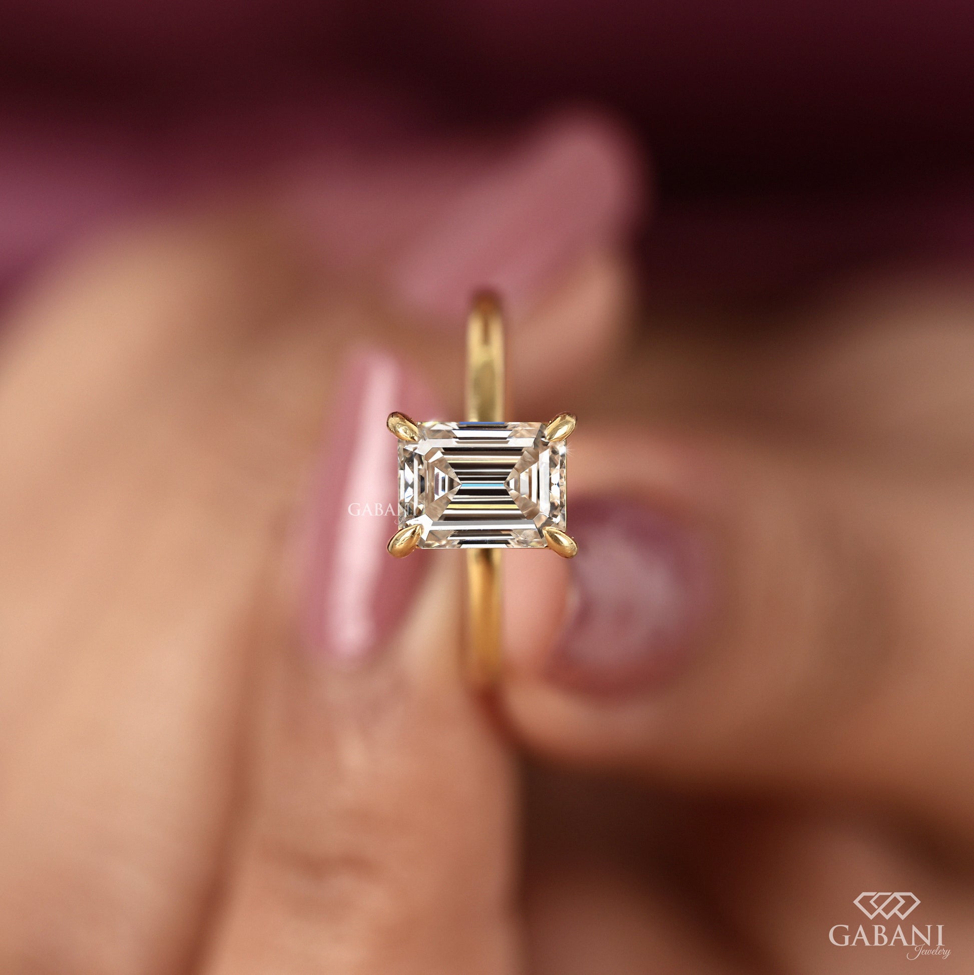 Pipe shank yellow gold ring with emerald cut lab grown diamond

