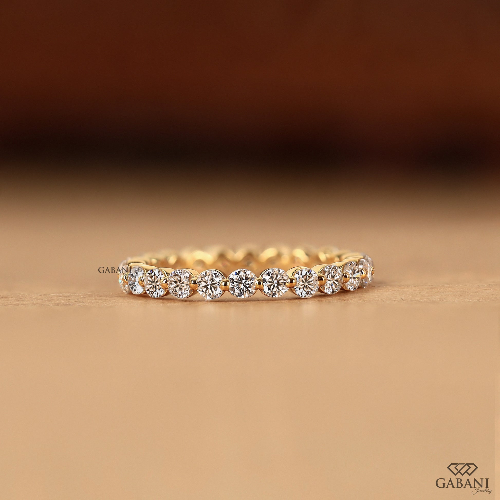 gold eternity wedding ring with round lab diamonds
