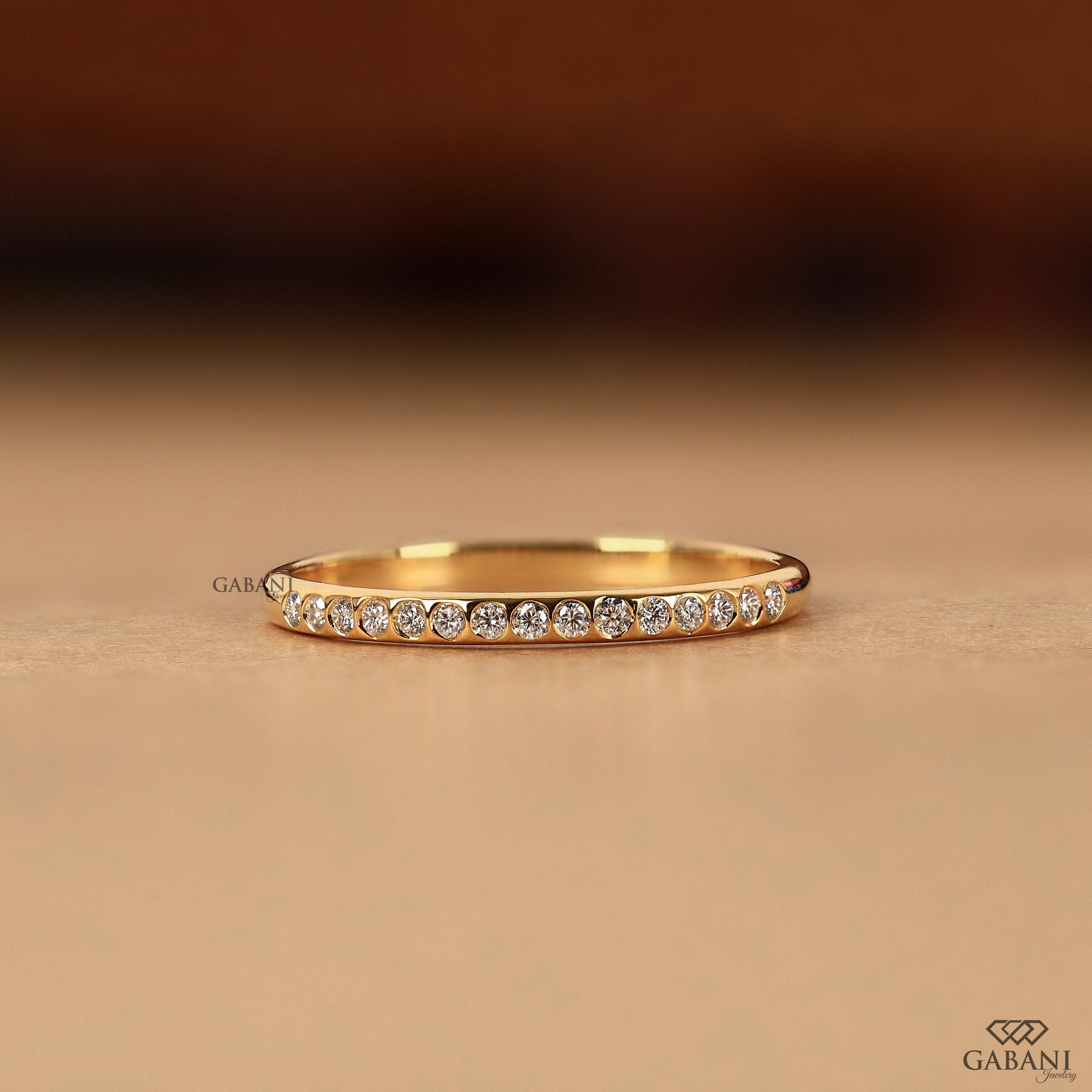 flush set lab grown diamond band in 14k gold with minimal dainty half eternity design