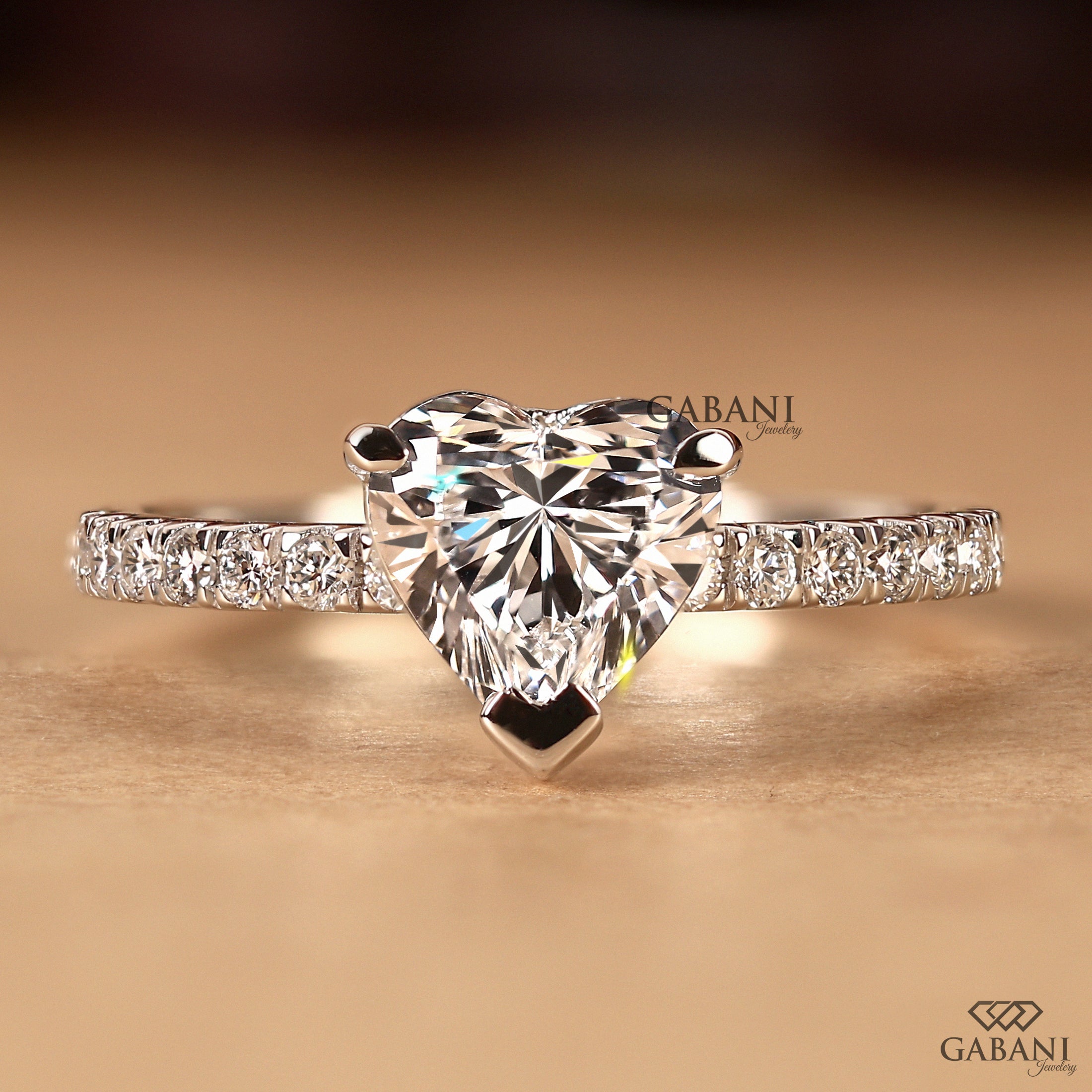 Heart cut IGI certified lab grown diamond engagement ring with pavé solitaire setting