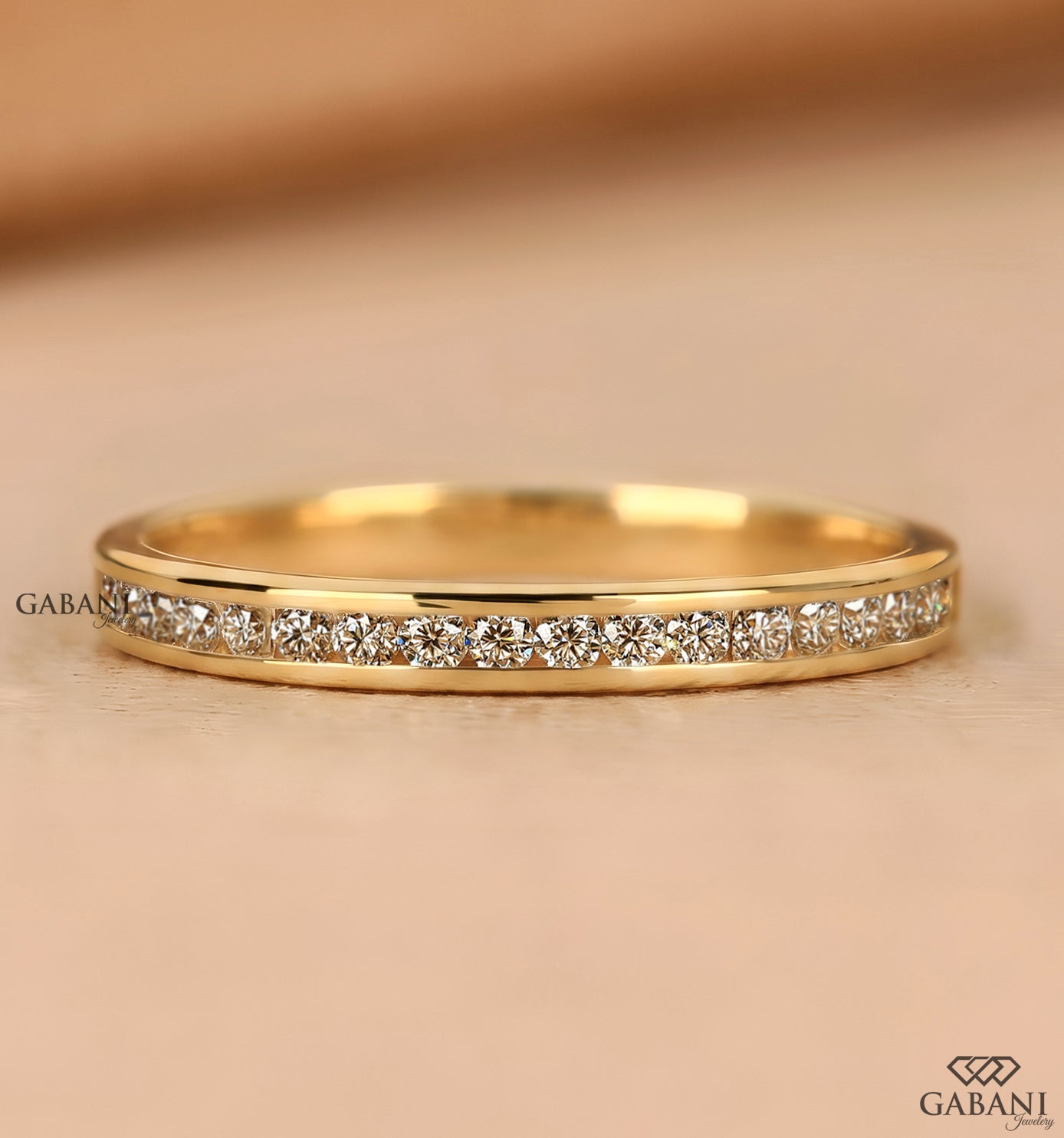 Round cut natural diamond channel set wedding band
