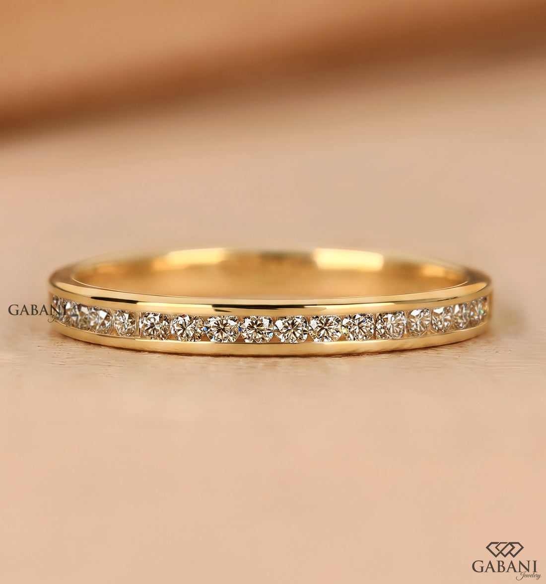 Round cut natural diamond channel set wedding band
