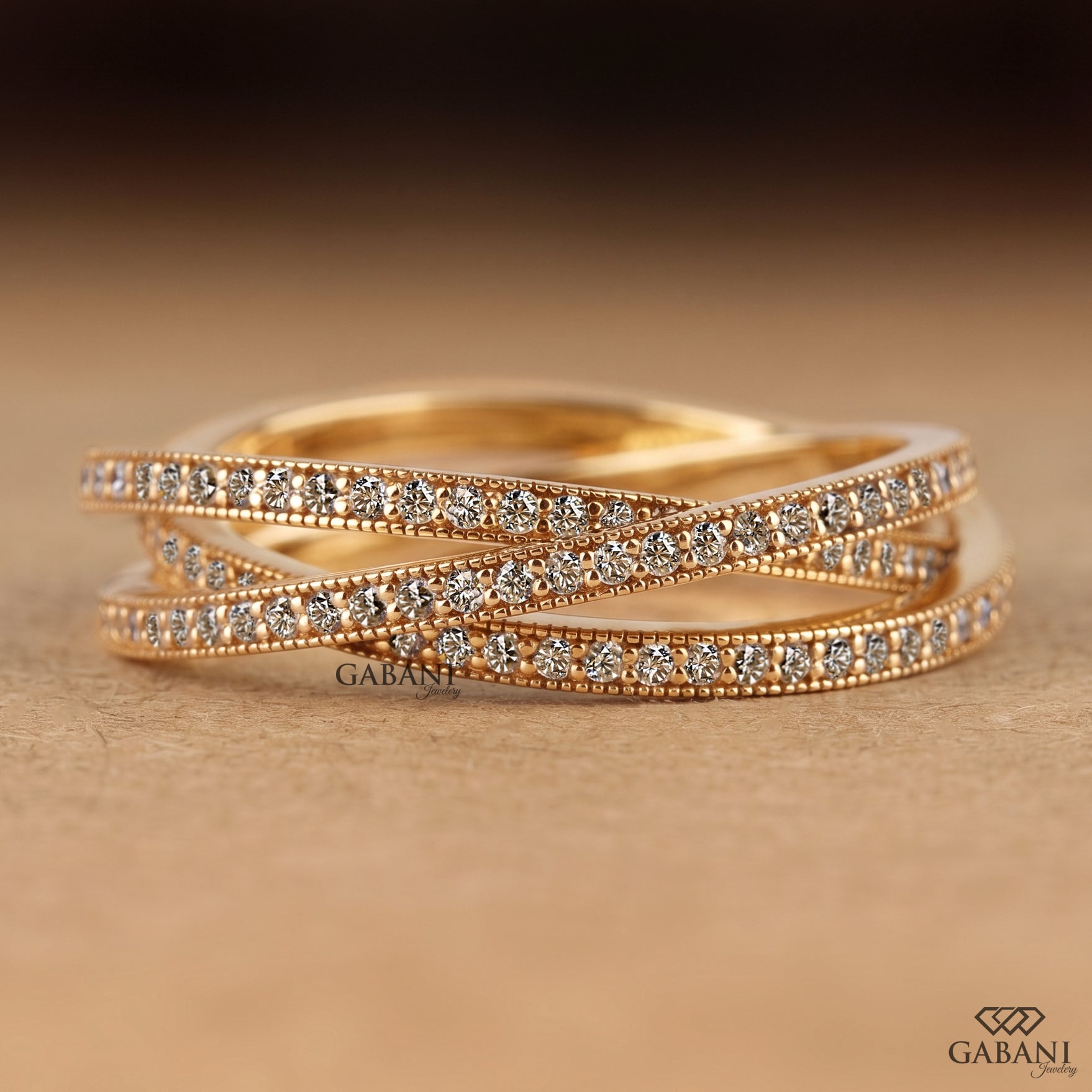 Criss cross lab grown diamond wedding band with a pave set crossover design for everyday wear