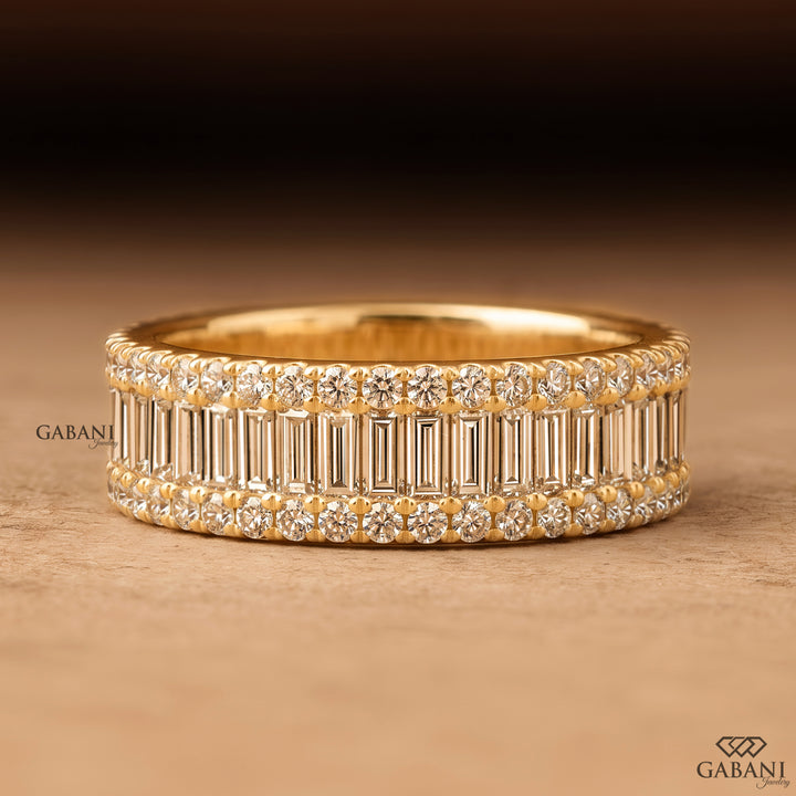 Front view of Gabani Jewelry wide yellow gold wedding band with baguette and round lab grown diamonds