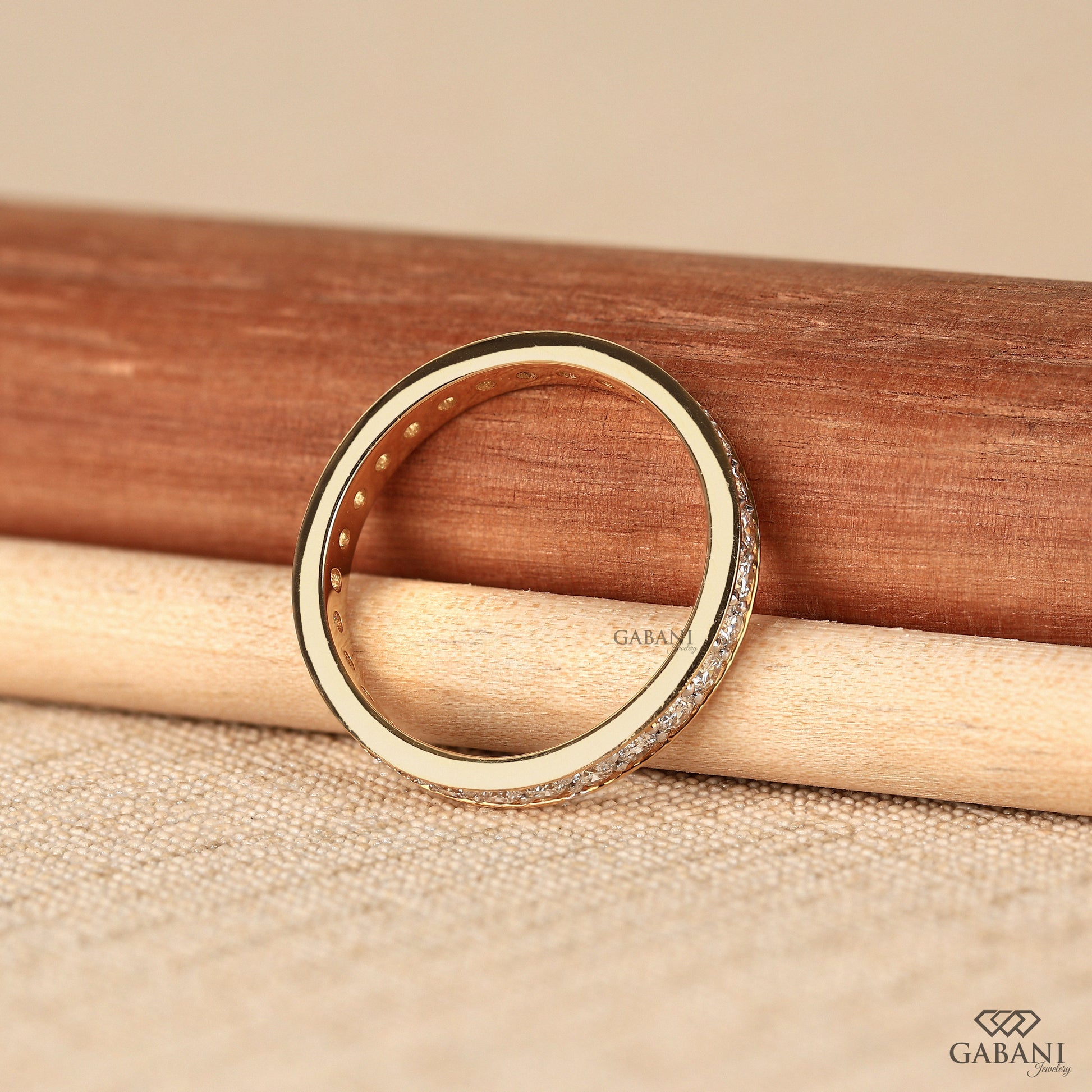 lab created diamond pavé eternity band with smooth gold finish