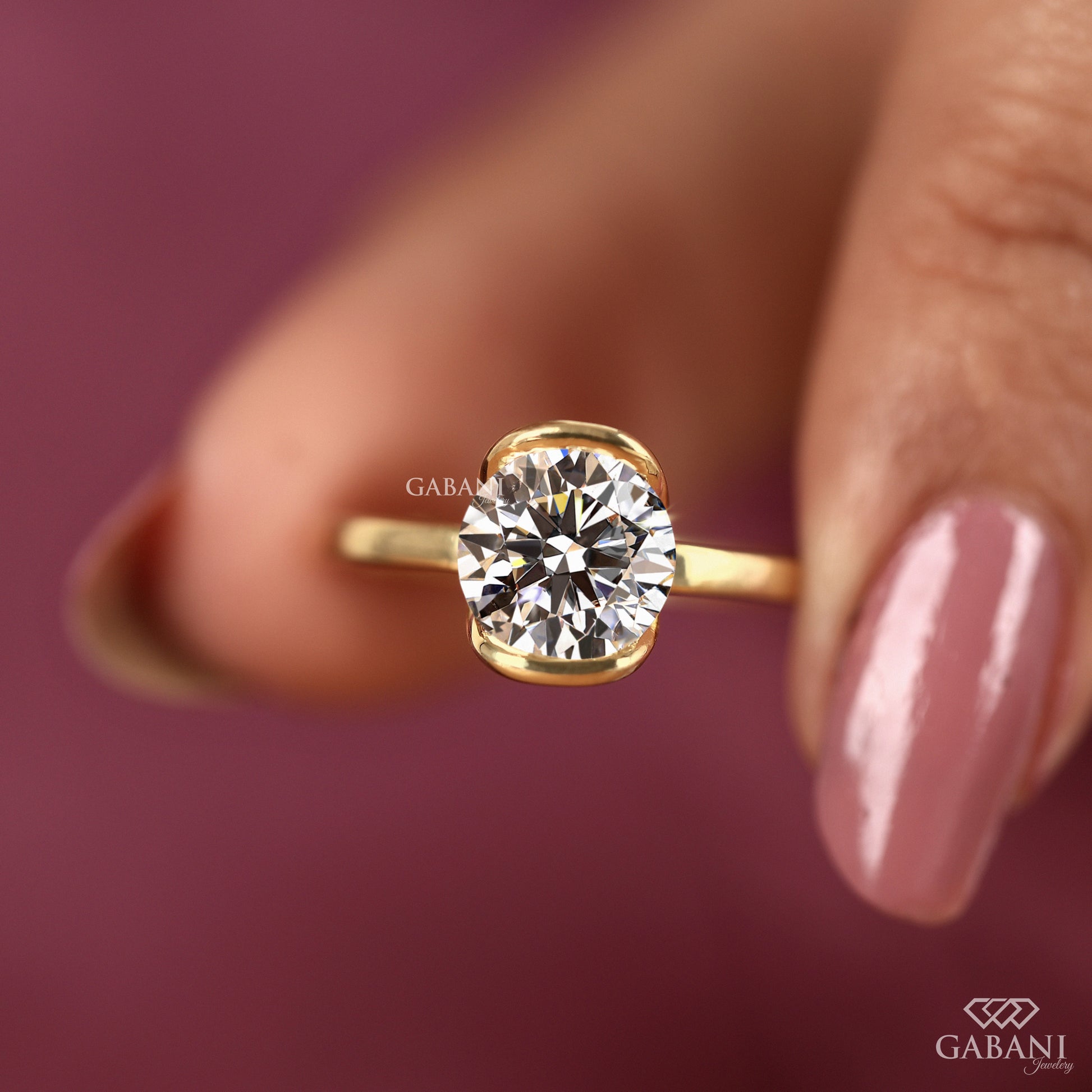 yellow gold round lab grown diamond ring with half bezel design
