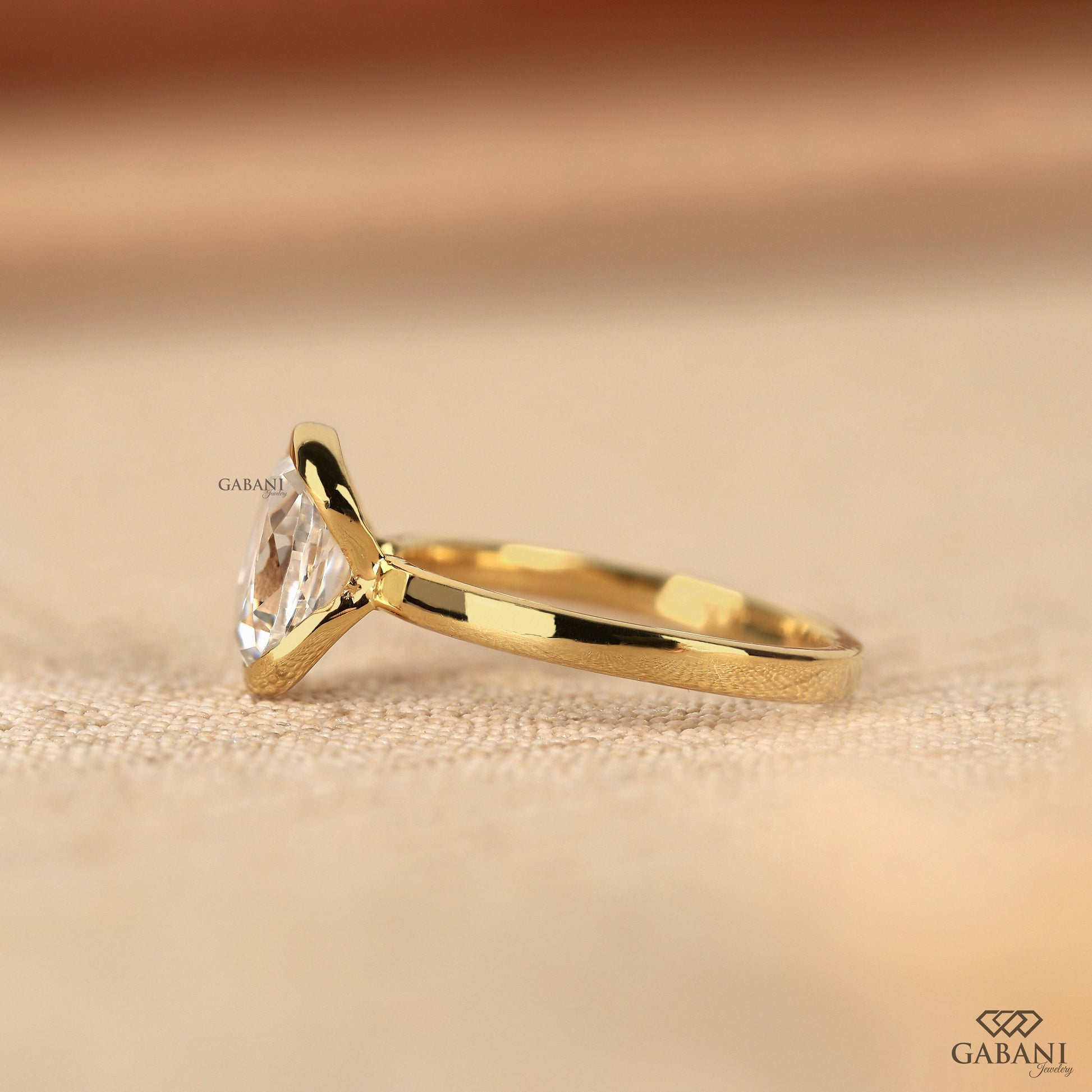 Unique old mine oval lab grown diamond solitaire ring with half bezel secure setting