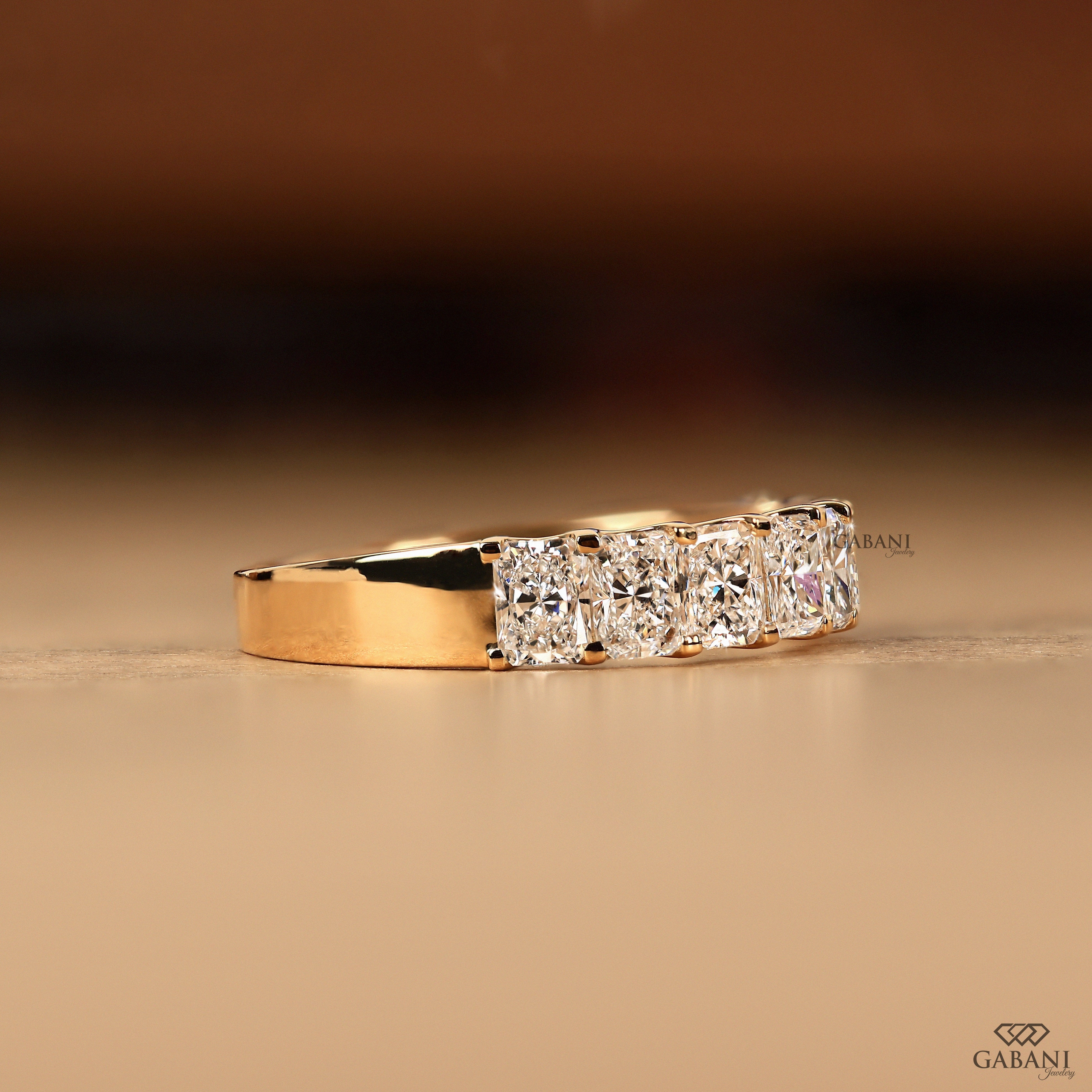 14K yellow gold lab grown diamond wedding band with 8 radiant stones
