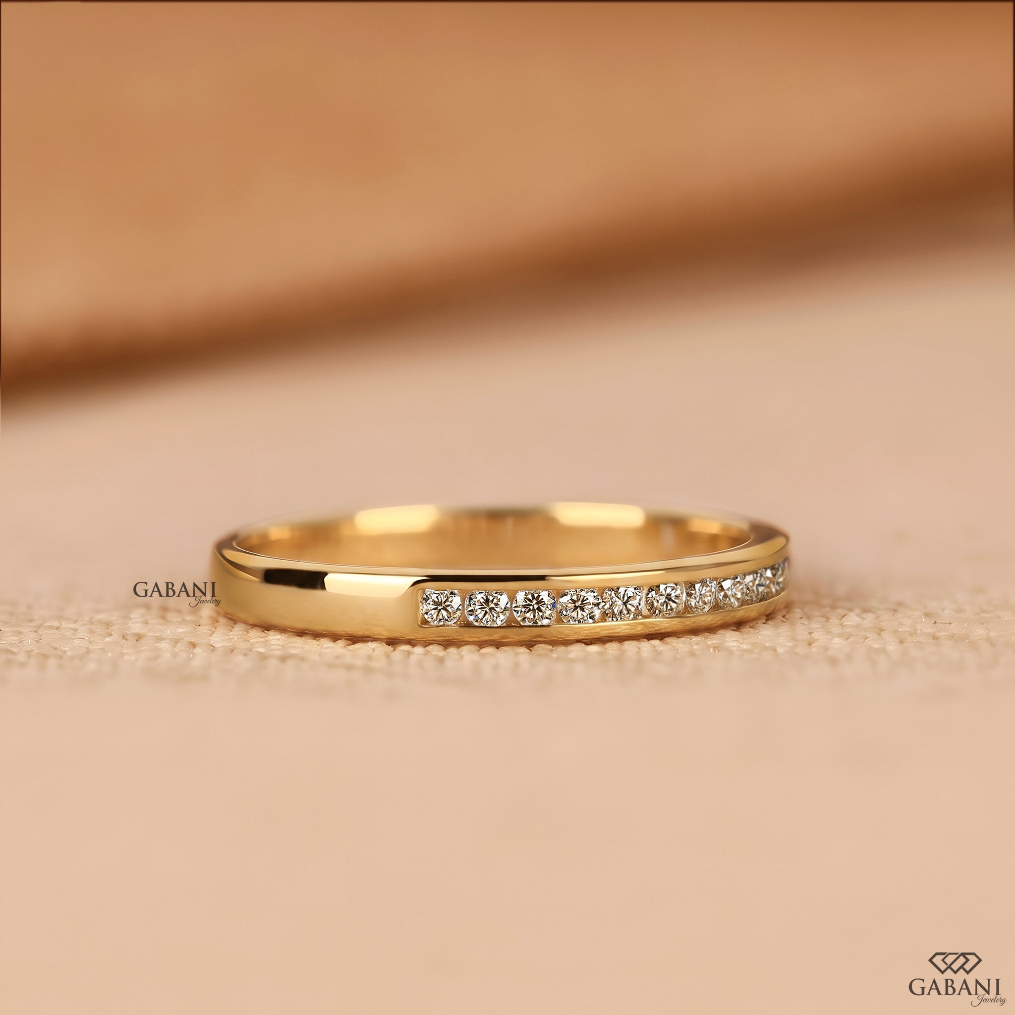 Natural diamond channel set half eternity band
