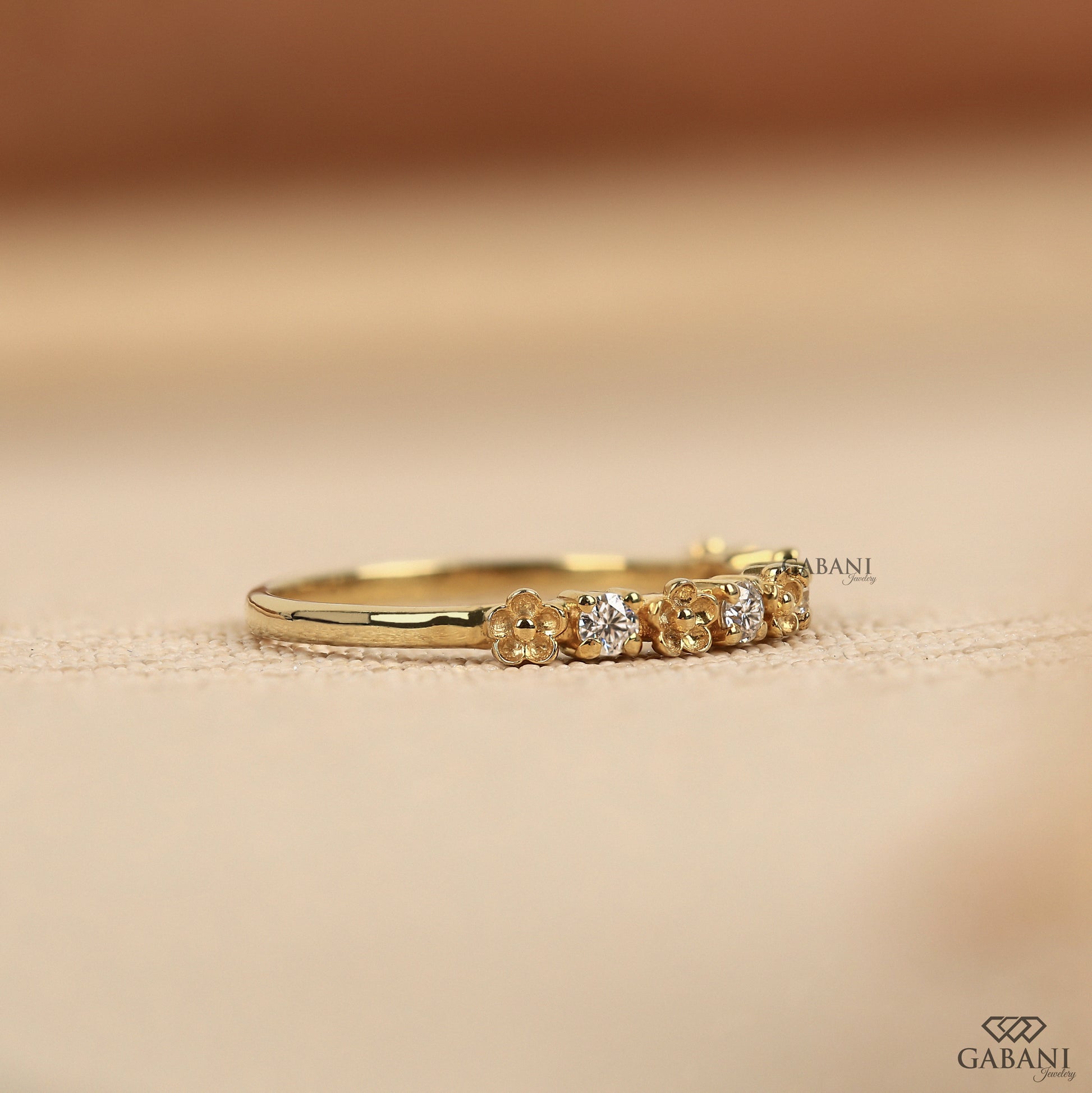 half eternity lab grown diamond band with a floral style and lightweight dainty profile