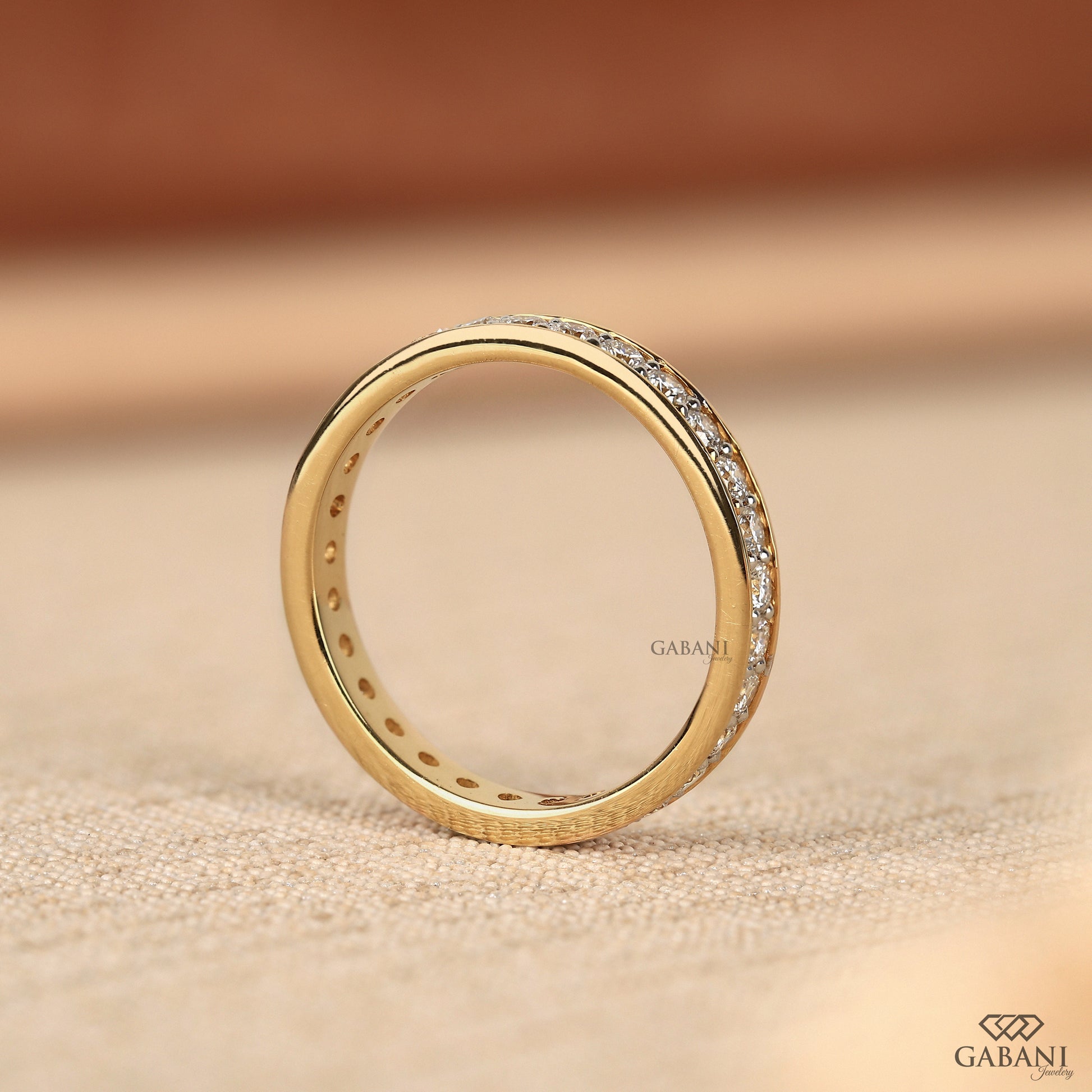 round diamond bridal eternity band in polished yellow gold