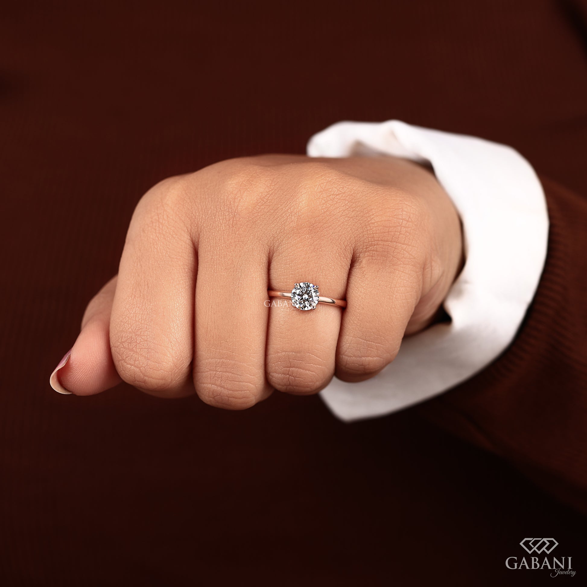 minimal solitaire ring with round lab grown diamond set in rose gold