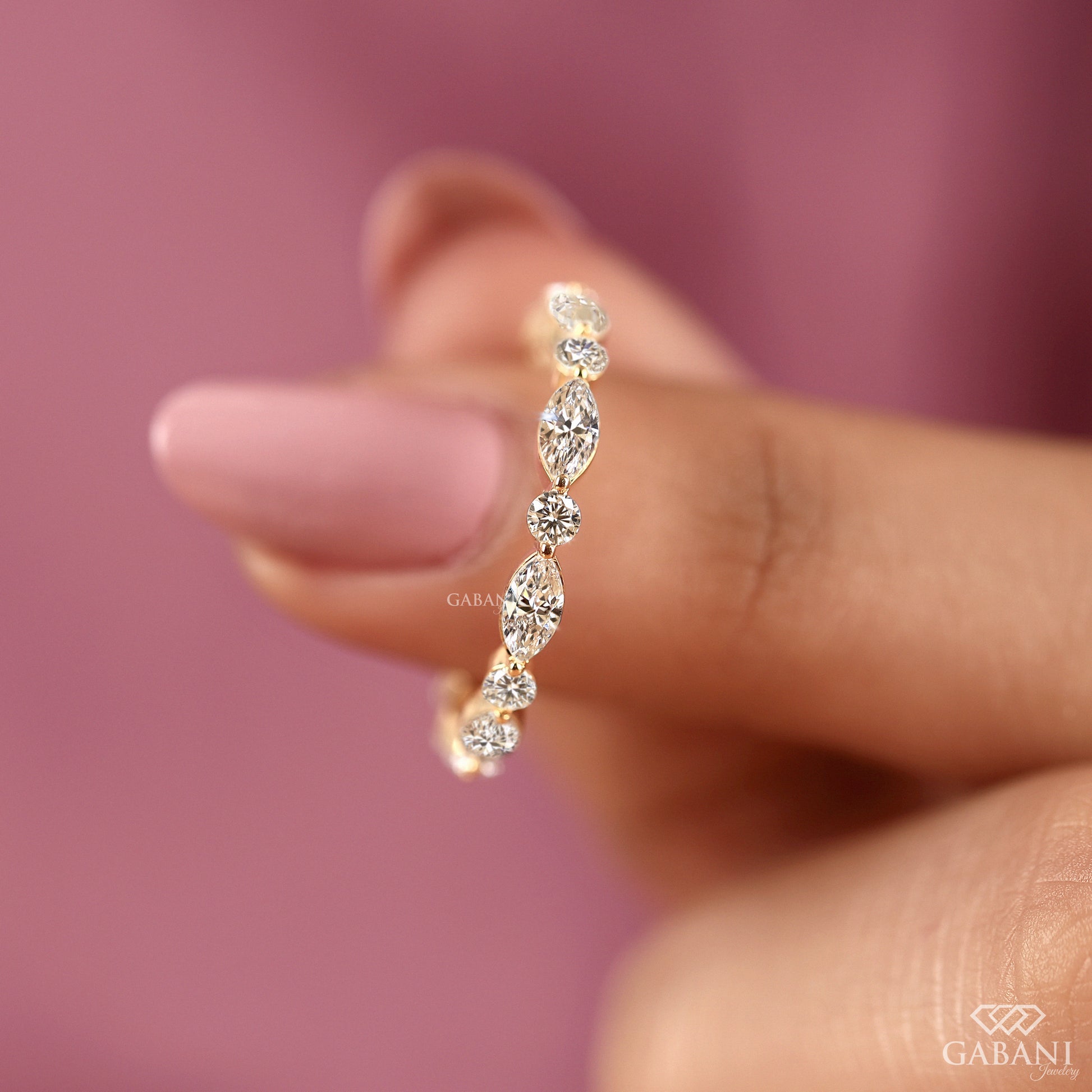 marquise and round lab diamond eternity band in gold