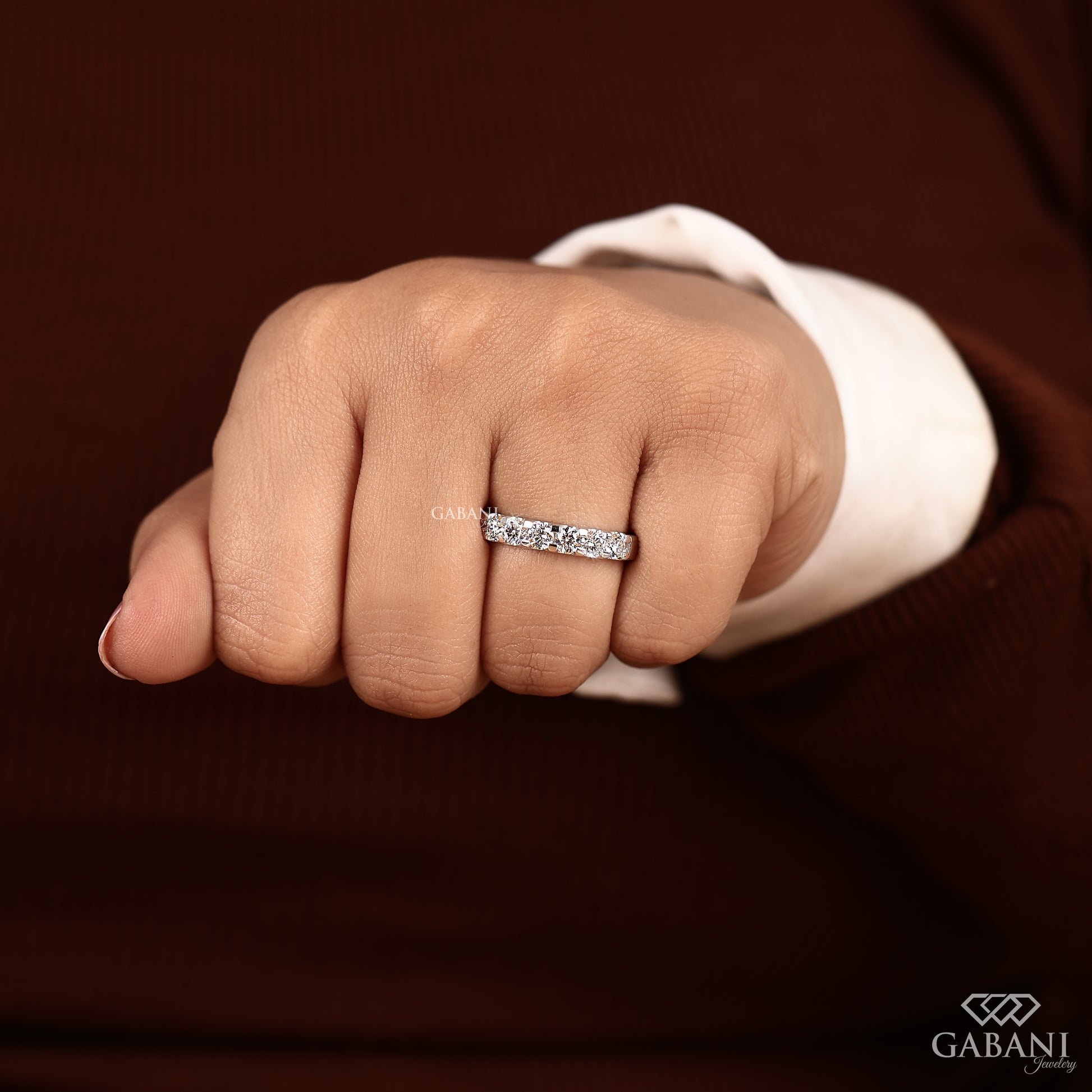 7 round cut lab grown diamond band with French pavé setting in smooth white gold ring