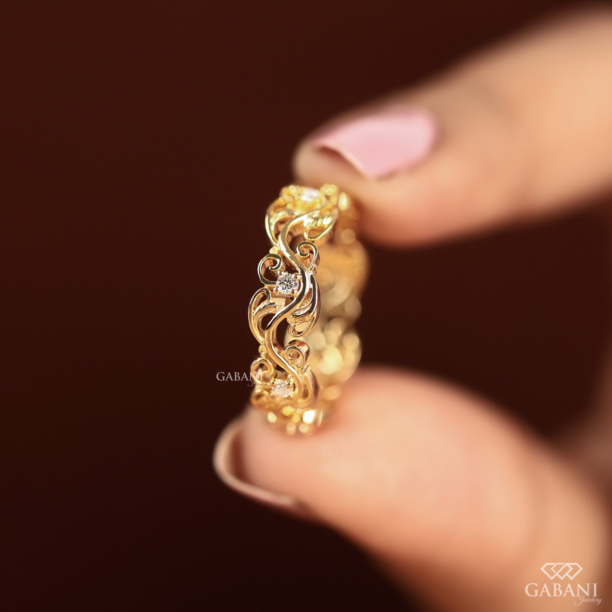 wide leaf style diamond eternity band in 14k yellow gold