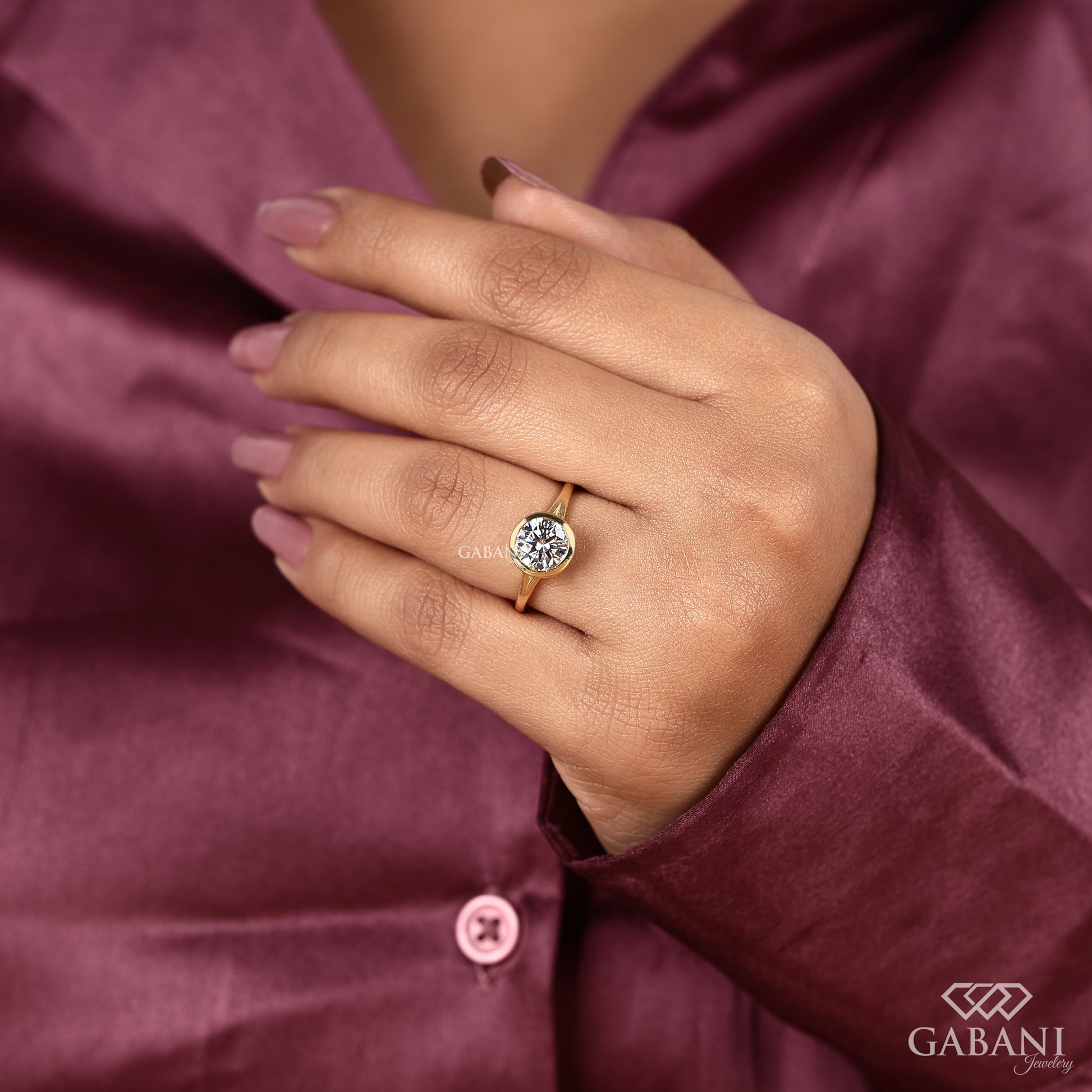 Bezel setting round lab grown diamond ring with split shank yellow gold band