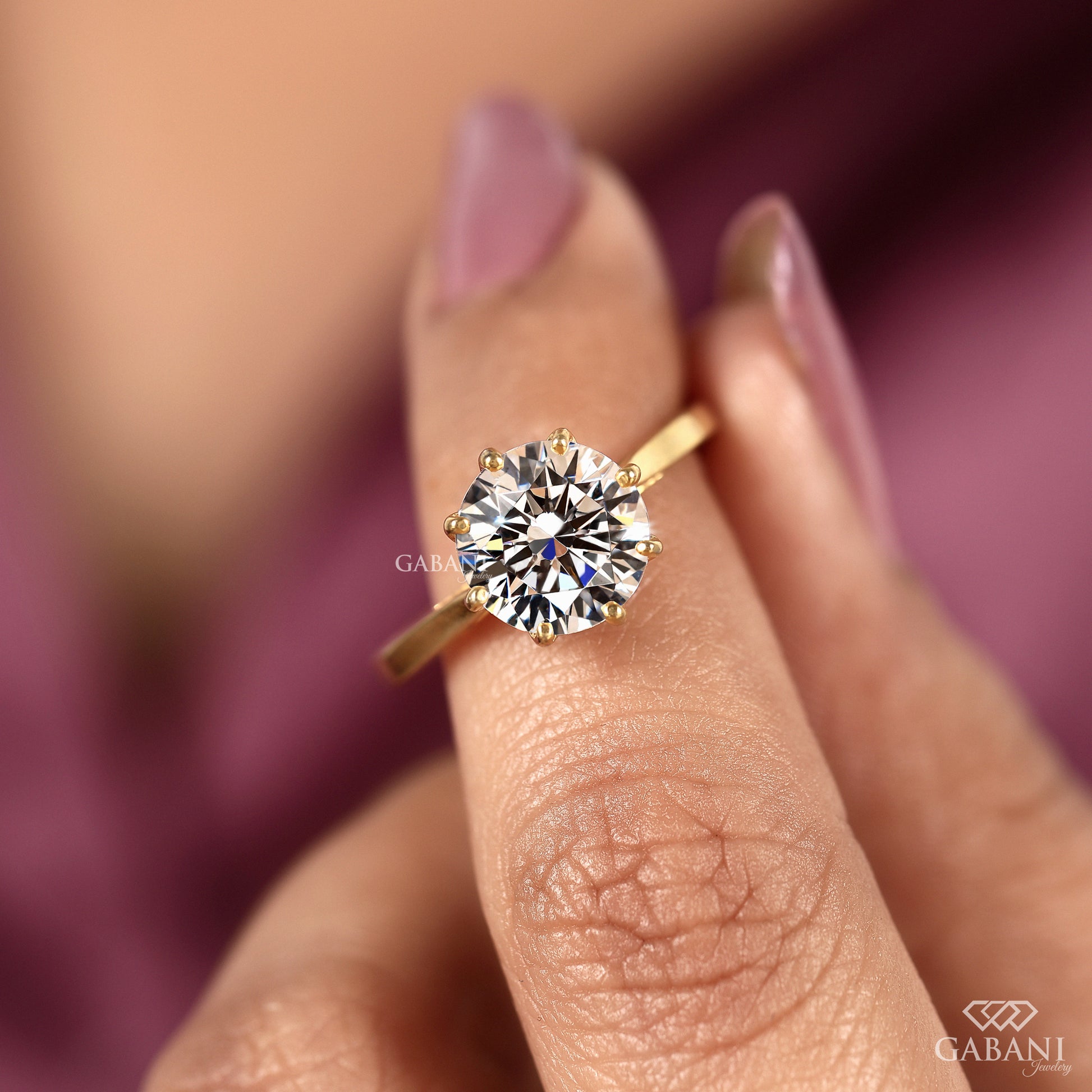 round lab grown diamond engagement ring in yellow gold with tulip setting