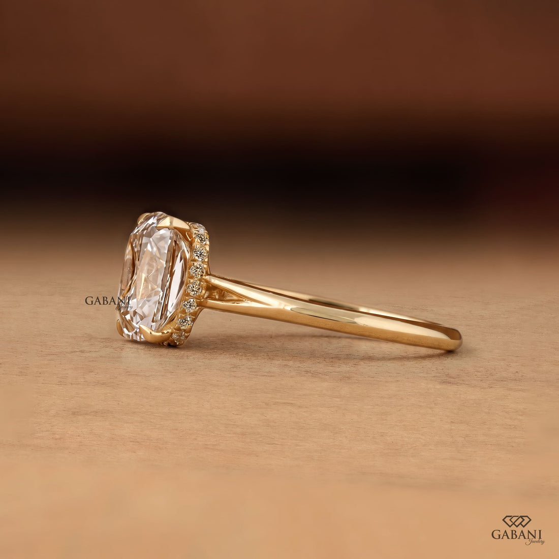 old mine cushion cut lab grown diamond engagement ring with hidden halo in 14K yellow gold