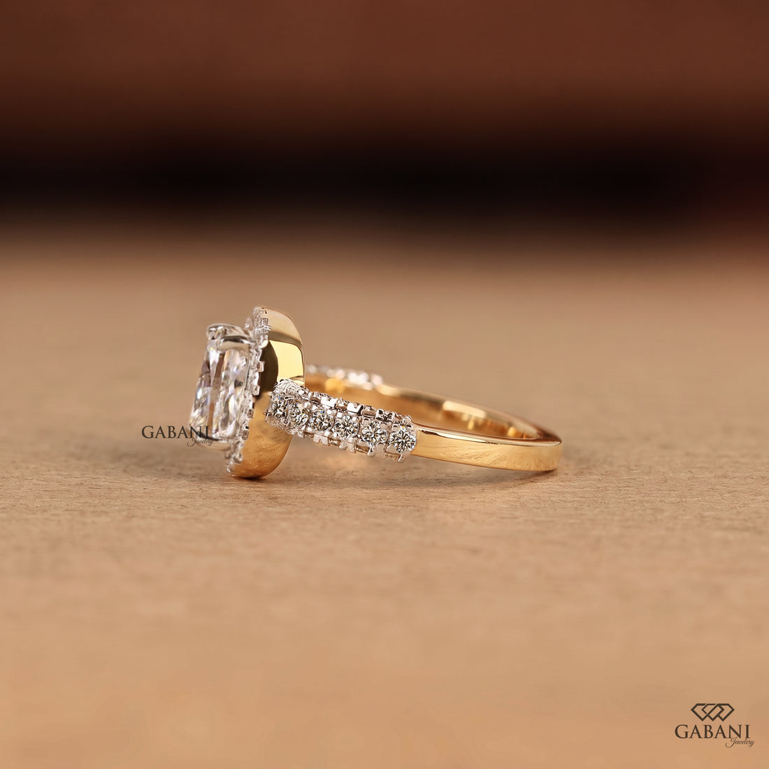 Cushion cut lab grown diamond halo engagement ring with pavé diamond setting in 14K gold