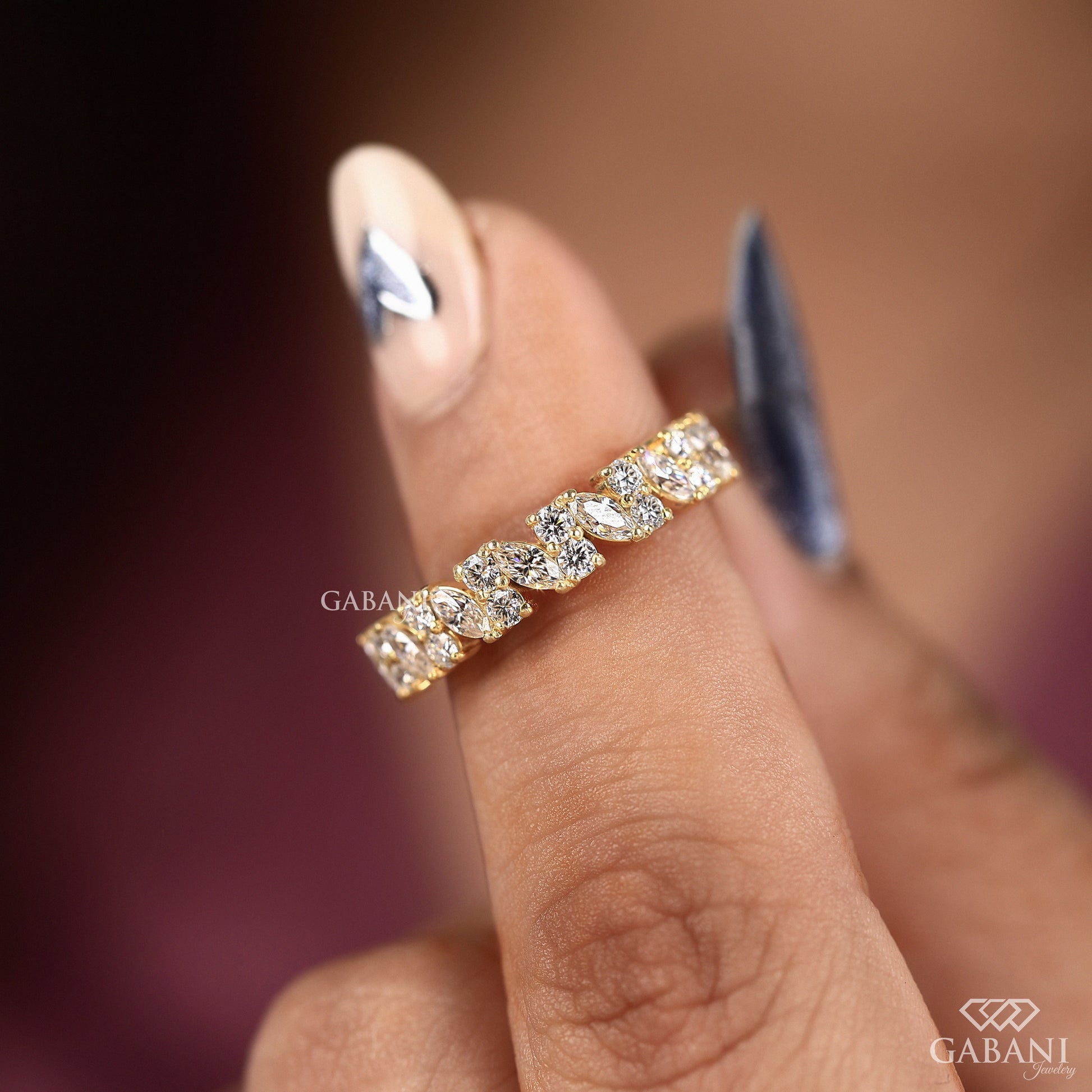 stacking wedding band with marquise and round lab grown diamonds set in smooth yellow gold