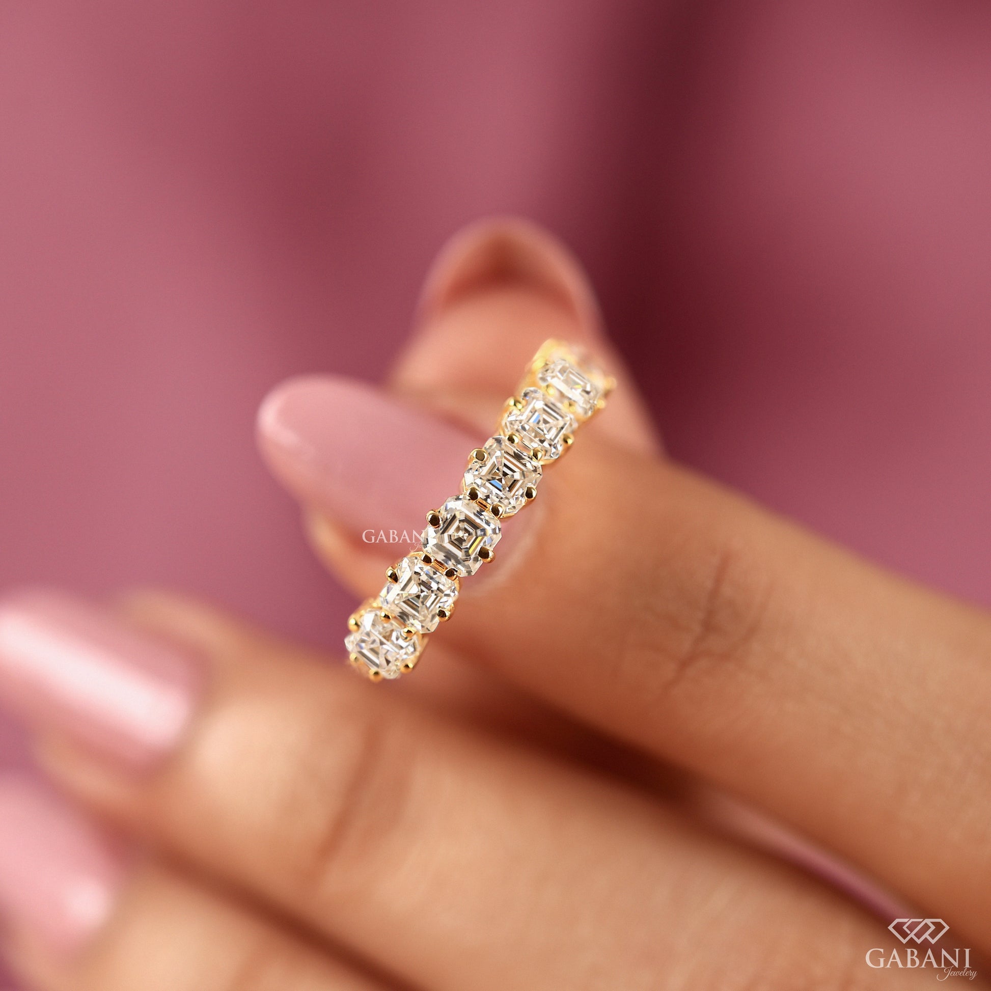 Asscher diamond anniversary ring with seven stones