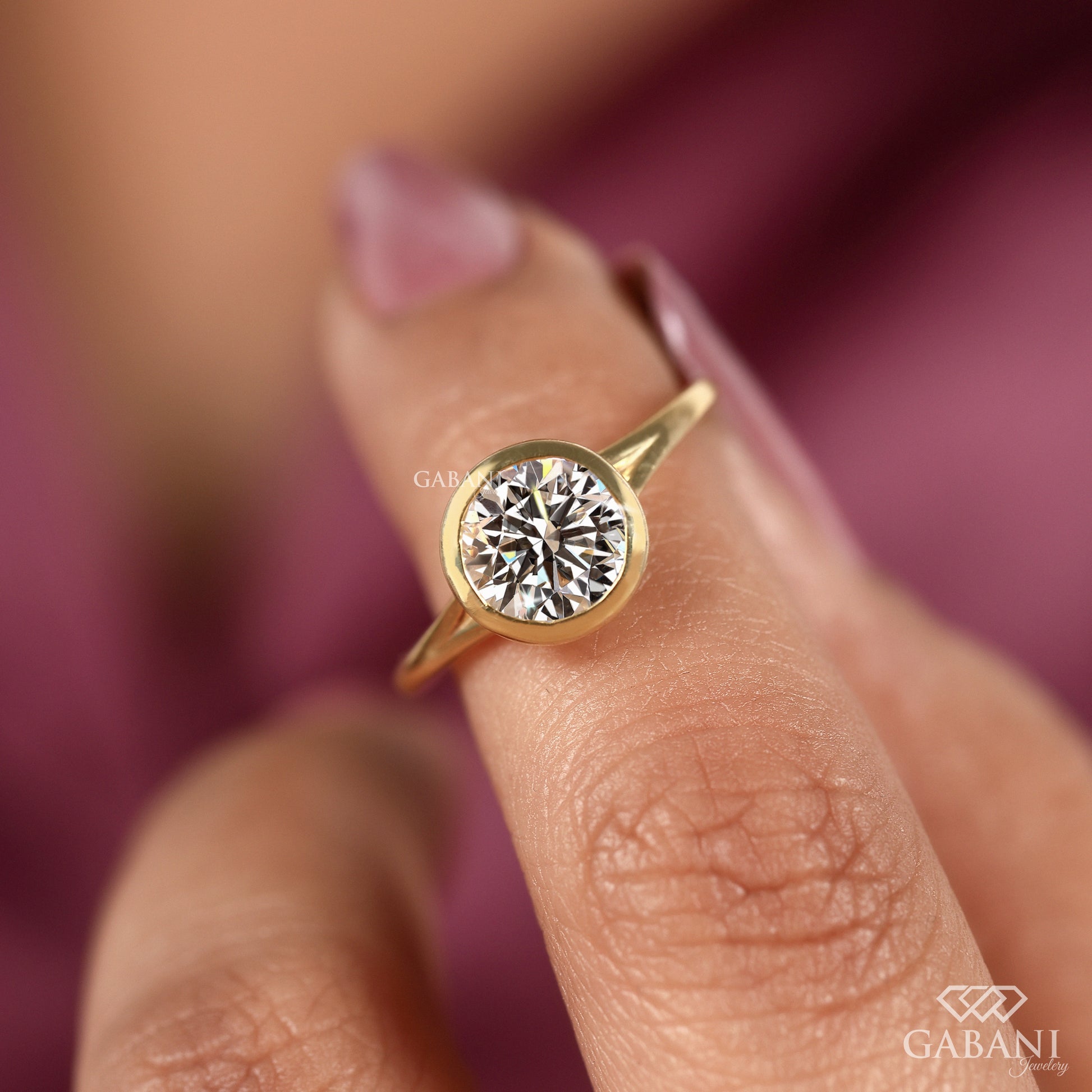 Minimal round lab grown diamond solitaire ring in yellow gold bezel style