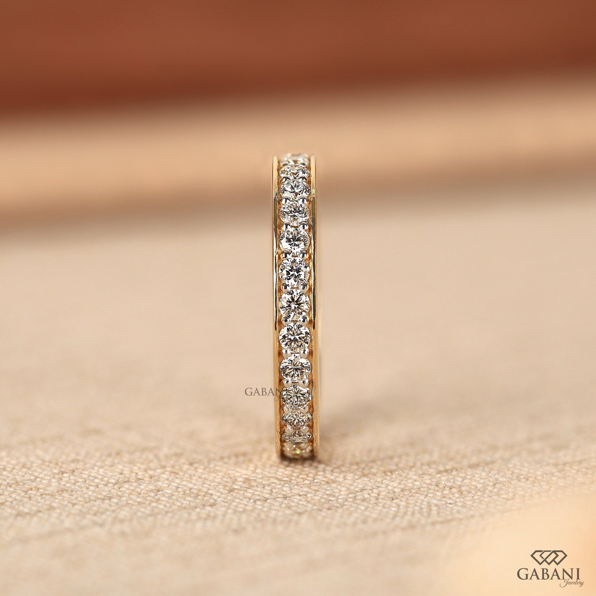 round diamond bridal eternity band in polished yellow gold