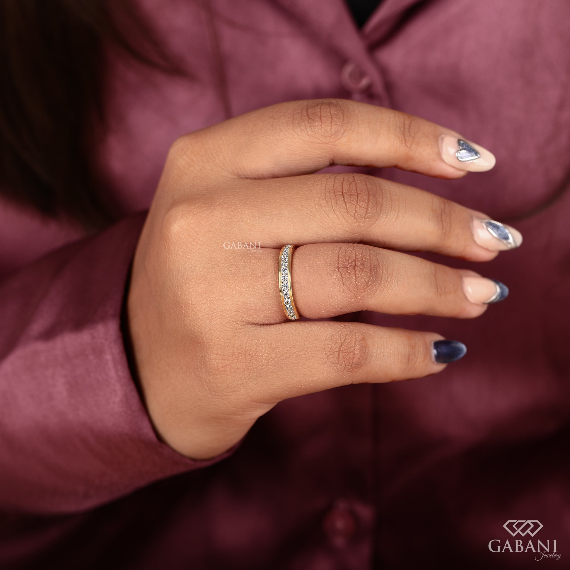 half eternity diamond band featuring round lab grown diamonds in channel setting