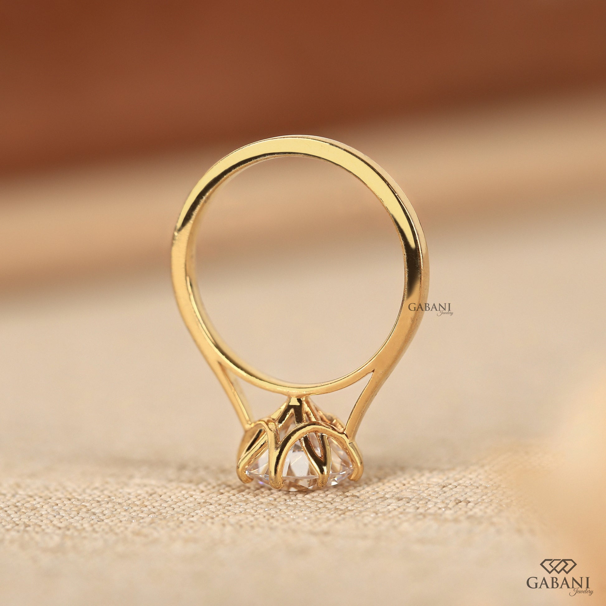 round lab grown diamond ring in yellow gold designed with six prong setting