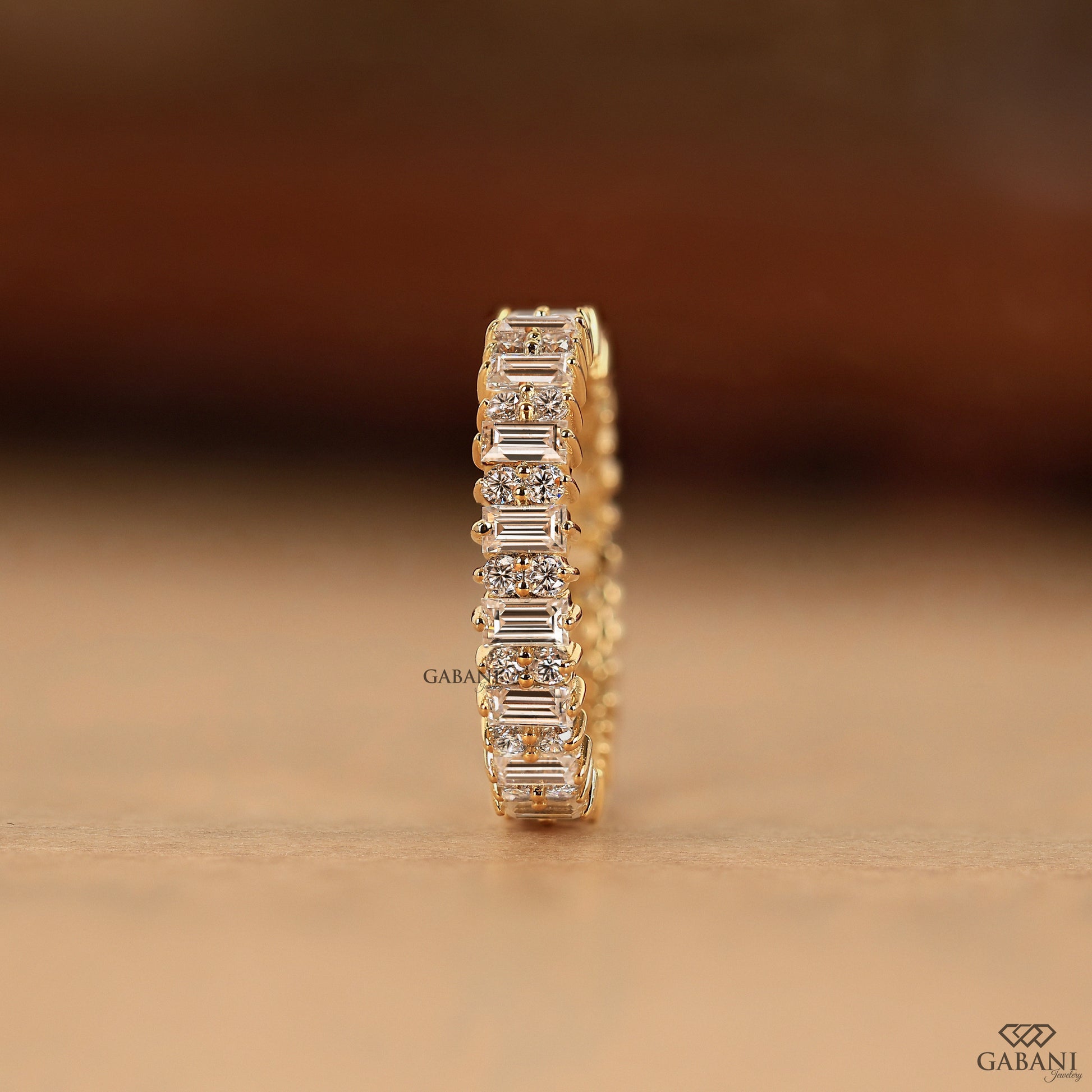 Wide lab diamond ring with round and baguette diamond layout