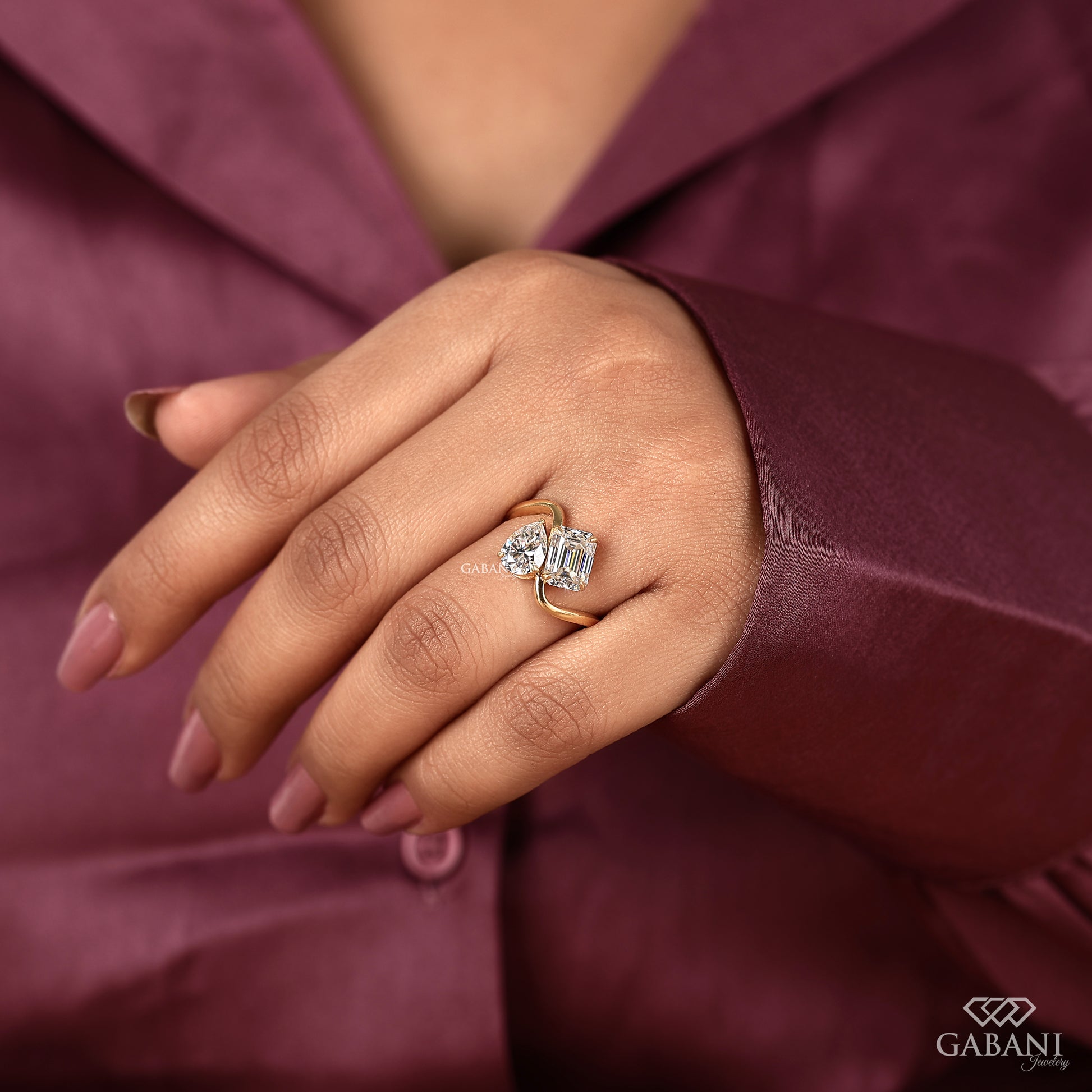 emerald and pear cut lab grown diamond you and me ring in solid yellow gold